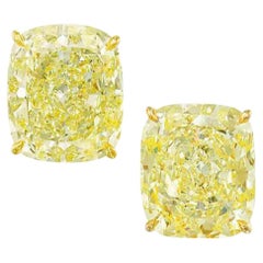 GIA Certified Fancy Yellow 4 Carat Cushion Cut Diamond Studs