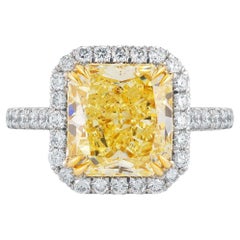 GIA Certified Fancy Yellow 4.60 Diamond Halo Pave Ring