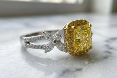 GIA Certified Fancy Yellow Cushion Cut Diamond Halo Engagement Ring