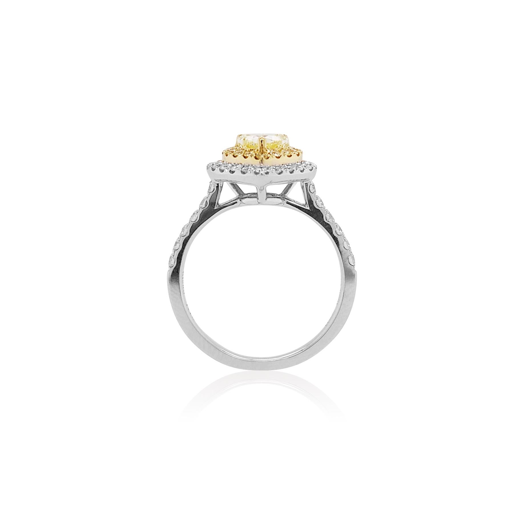 Contemporary GIA Certified Fancy Yellow Diamond and White Diamond Ring in 18 Karat White Gold