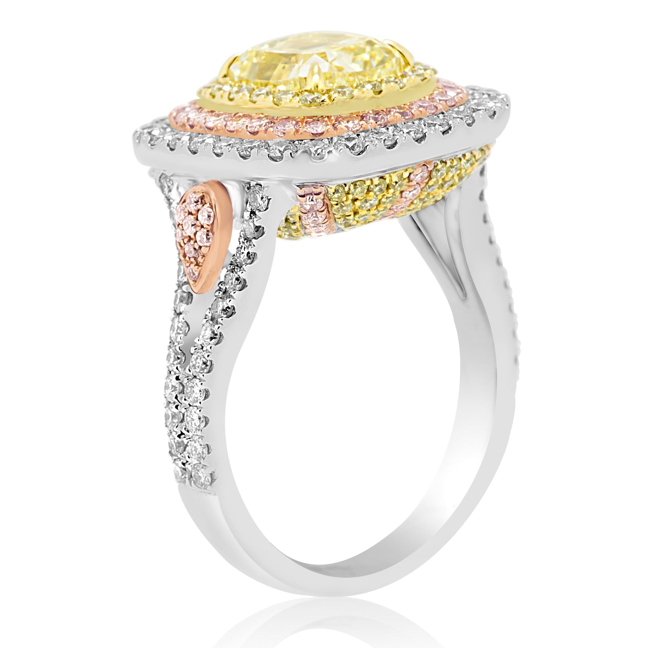 GIA Certified Fancy Yellow Diamond Cushion Triple Halo Three-Color Gold Ring In New Condition In NEW YORK, NY