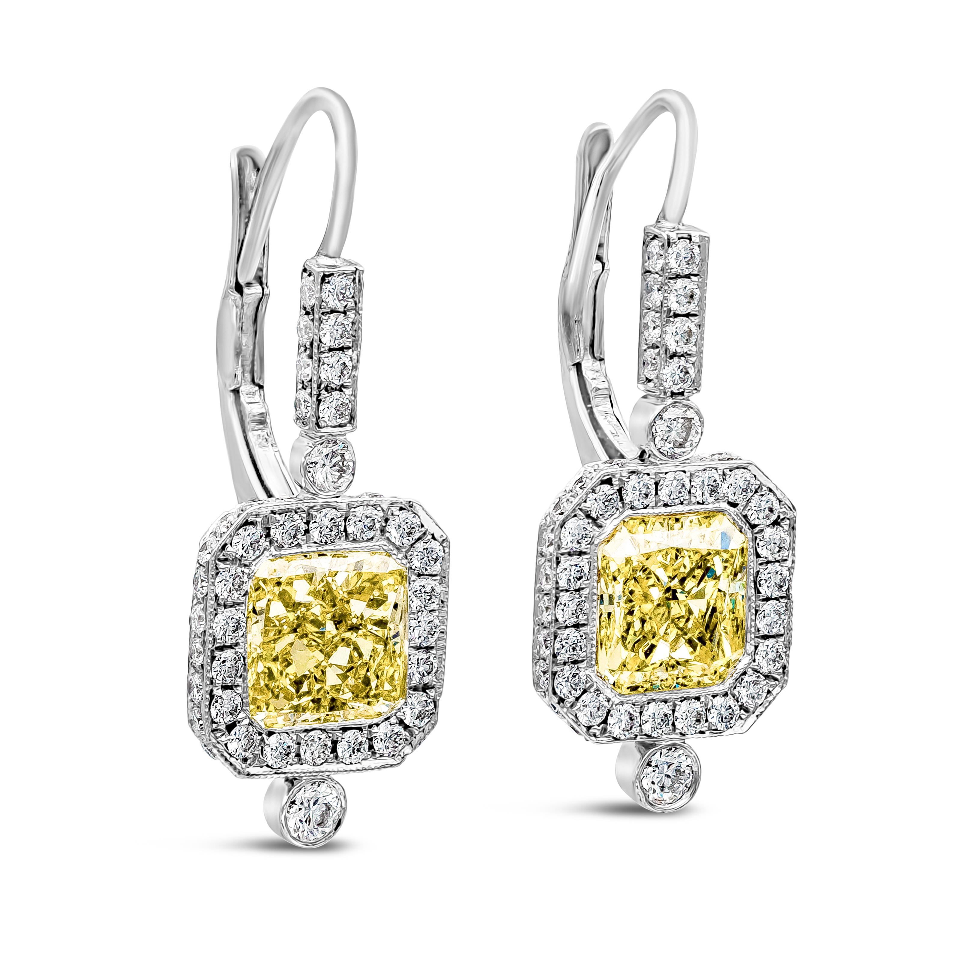 Modern GIA Certified Fancy Yellow Diamond Halo Dangle Earrings For Sale