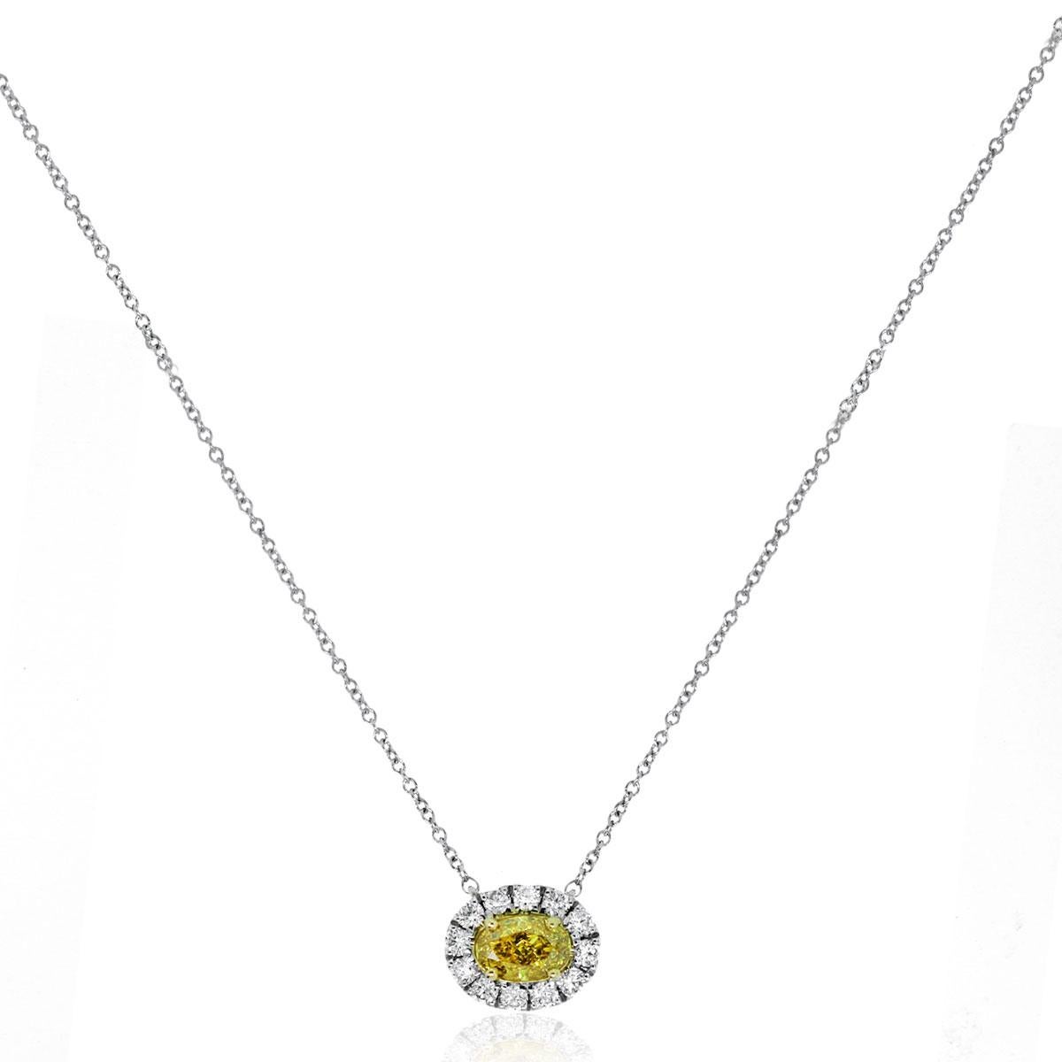 Material: 18k White Gold
Diamond Details: Approximately 0.52ct fancy yellow diamonds and approximately 0.30ctw halo round brilliant diamonds. Diamonds are H in color and SI2 in clarity.
Necklace Measurements: 18″
Pendant Measurements: 0.39″ x 0.22″