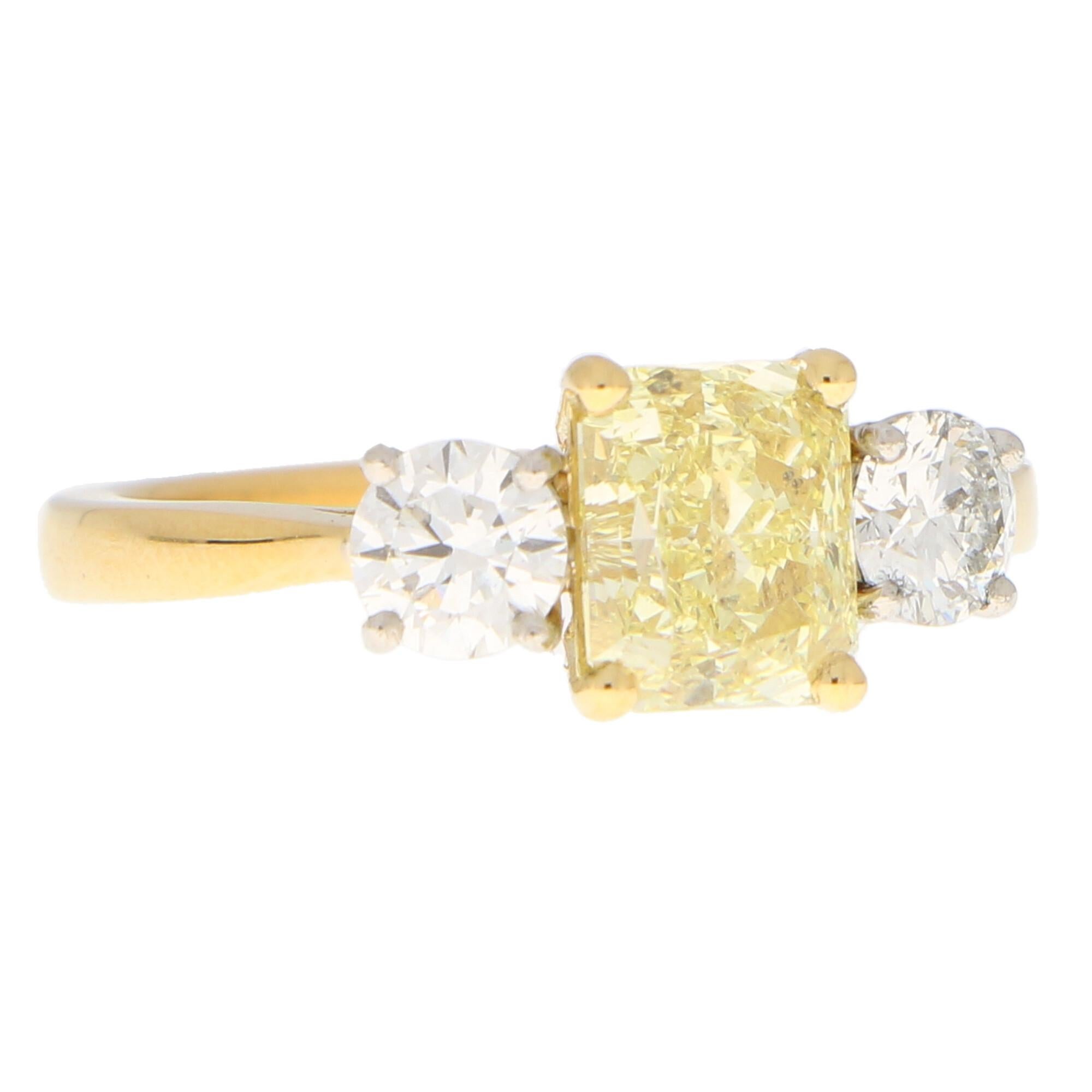 Emerald Cut GIA Certified Fancy Yellow Diamond Three Stone Engagement Ring in 18k Gold