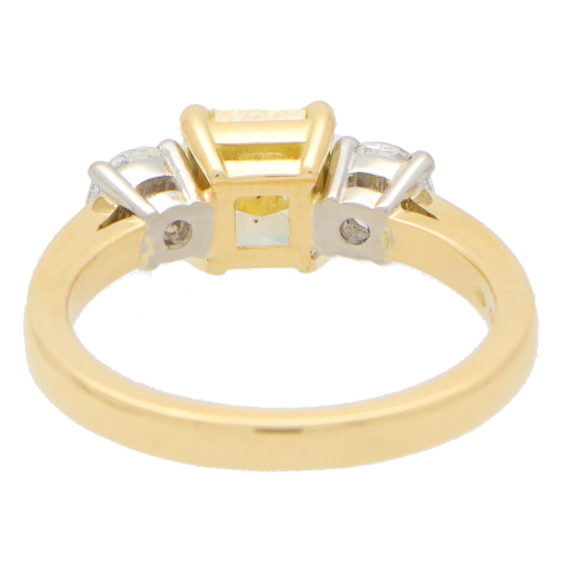 GIA Certified Fancy Yellow Diamond Three Stone Engagement Ring in 18k Gold In Excellent Condition In London, GB