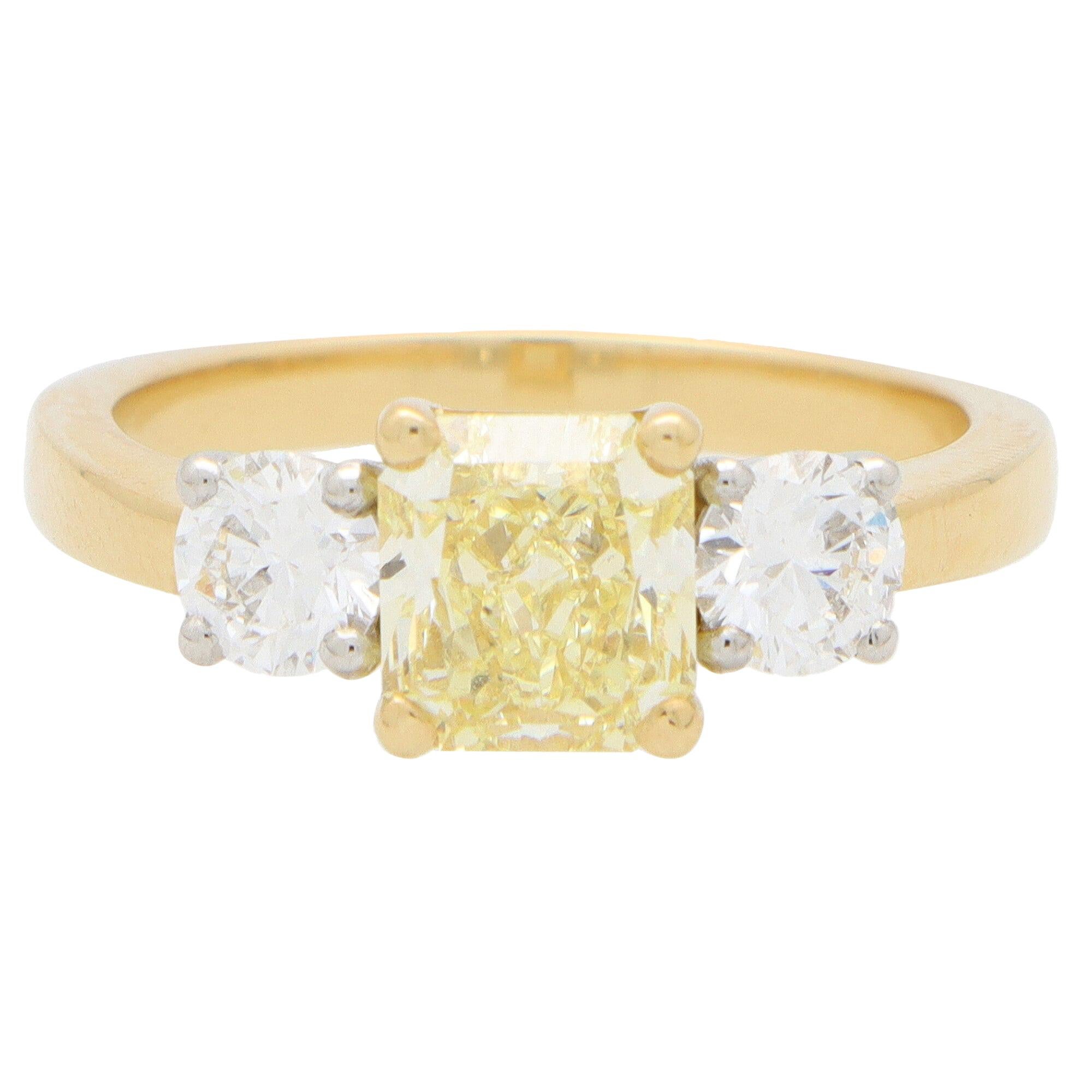 GIA Certified Fancy Yellow Diamond Three Stone Engagement Ring in 18k Gold