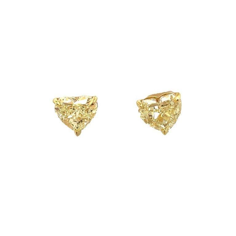 Heart Cut GIA Certified Fancy Yellow Heart Shape Diamond Studs 4.15ct in 14k Yellow Gold  For Sale