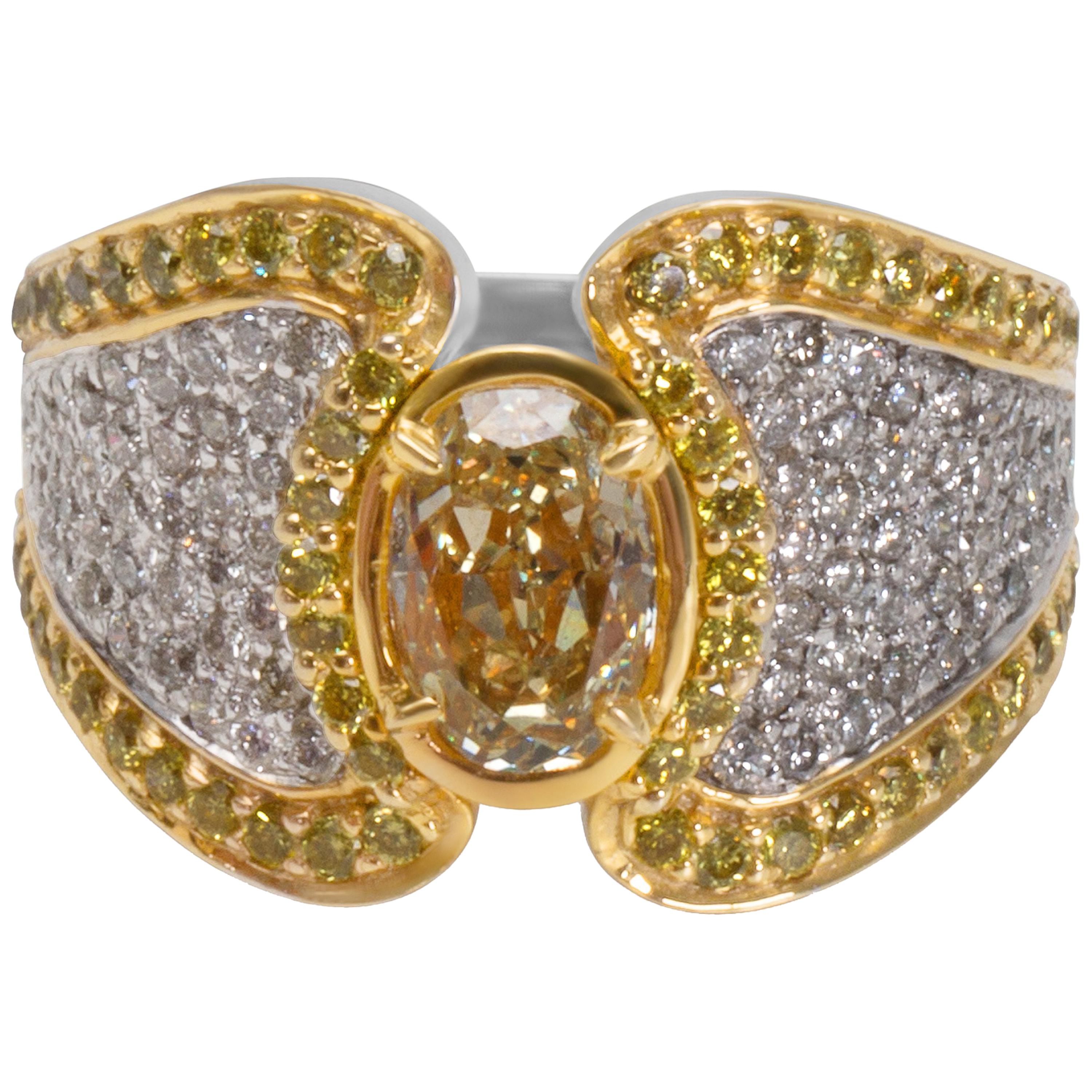 GIA Certified Fancy Yellow Oval Diamond Ring in 18 Karat Gold 1.02 Carat