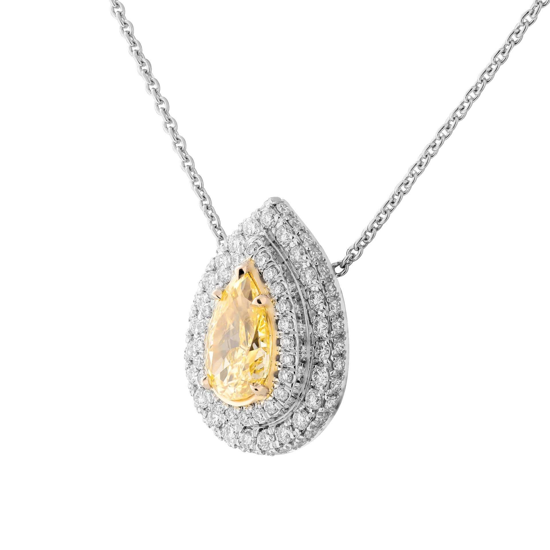A timeless classic !
Beautiful Fancy Yellow Pear Shape Diamond Pendant with 2 rows of white diamond halo around to highlight the beauty of the stone, totaling 0.5ct of full brilliant cut round diamonds mounted in Platinum950 & 18K Yellow Gold
Center