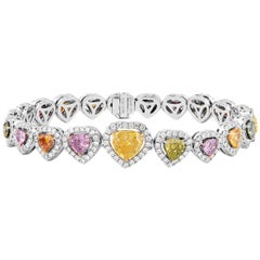 GIA Certified Fancy Yellow Pink 7.78 Carat Natural Colored Diamond Bracelet