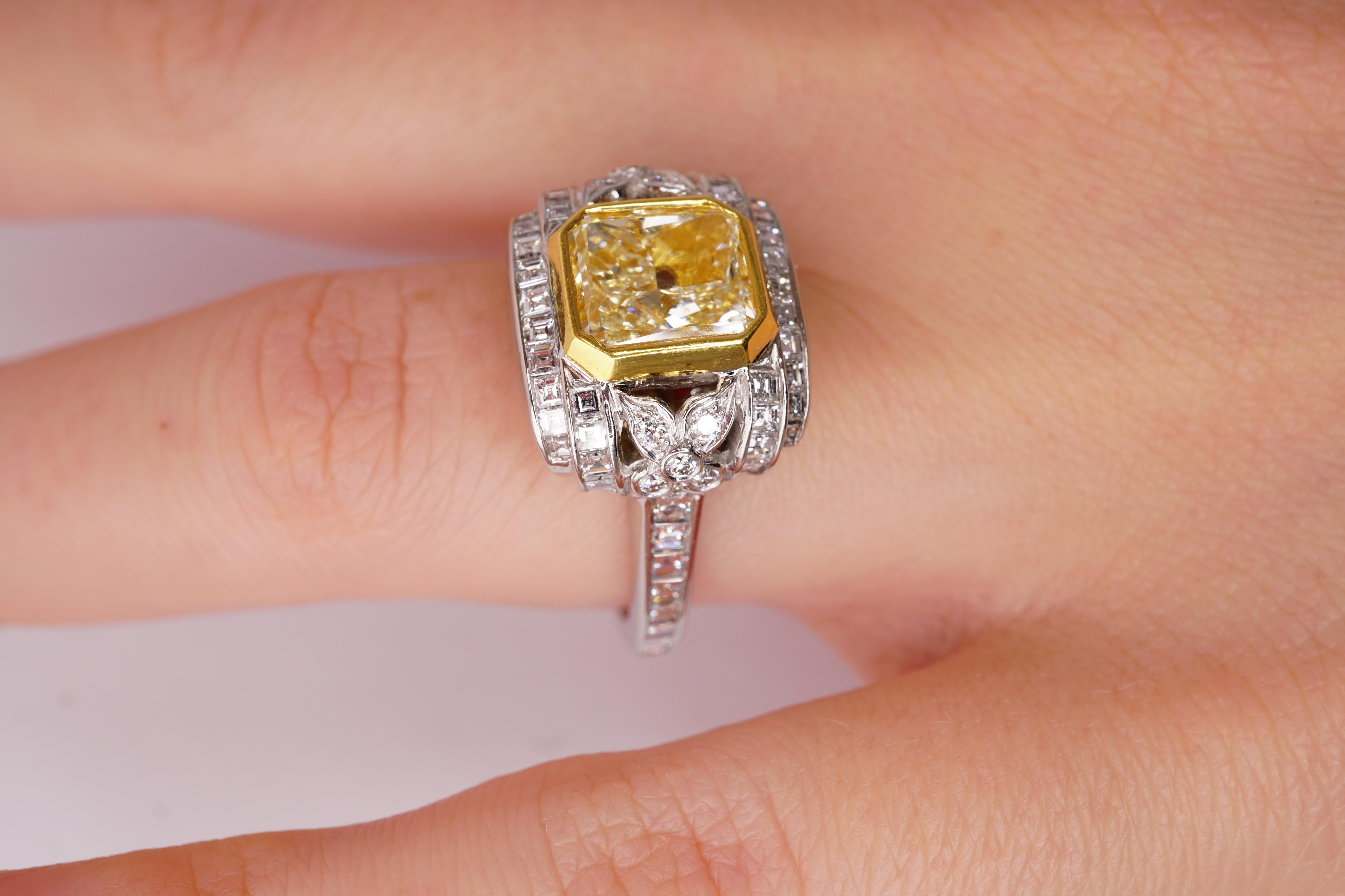 GIA Certified Fancy Yellow Radiant 2.23 Ct Diamond Engagement Platinum Ring In New Condition For Sale In New York, NY