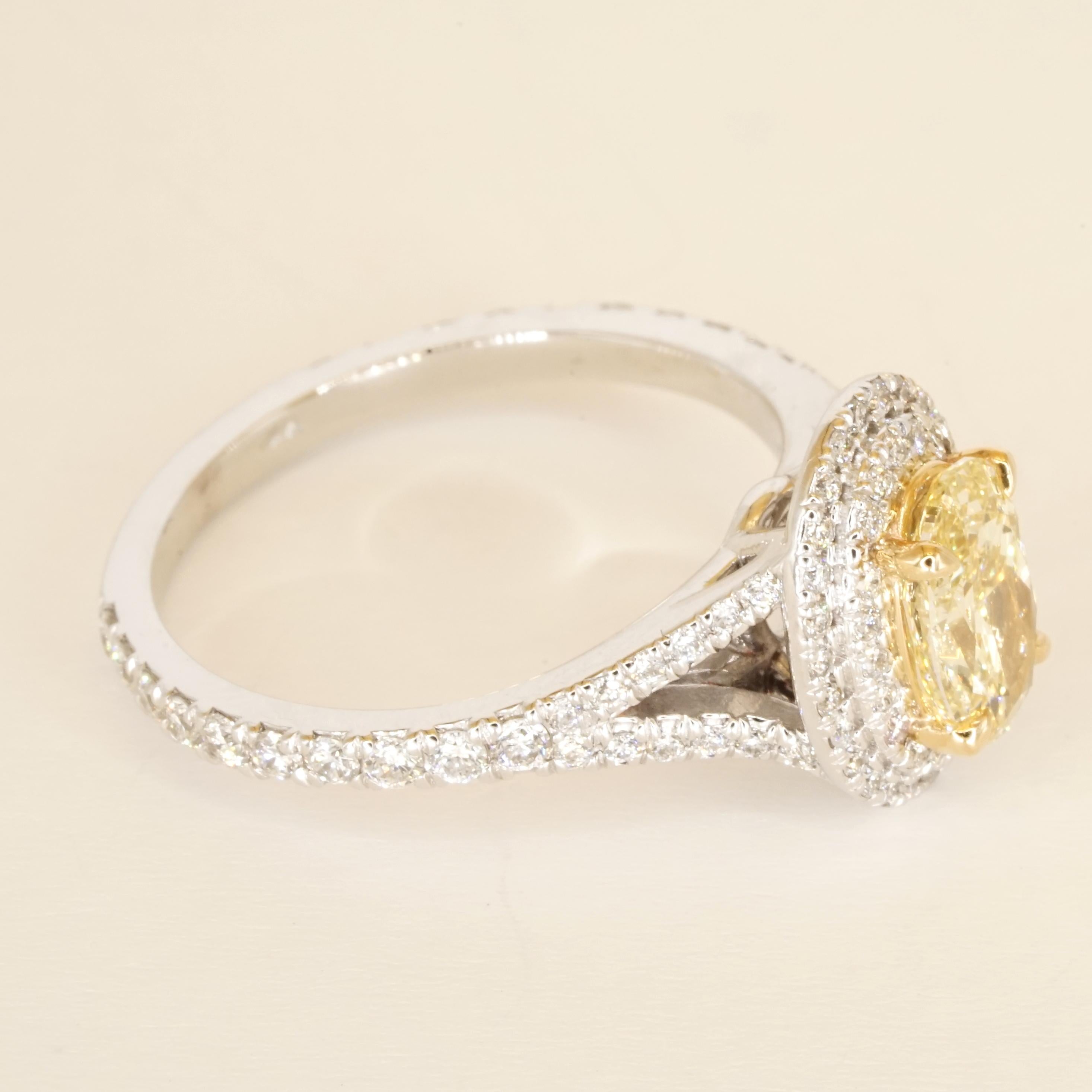 GIA Certified Fancy Yellow VVS2 Oval Diamond Double Halo Gold Ring For Sale 5