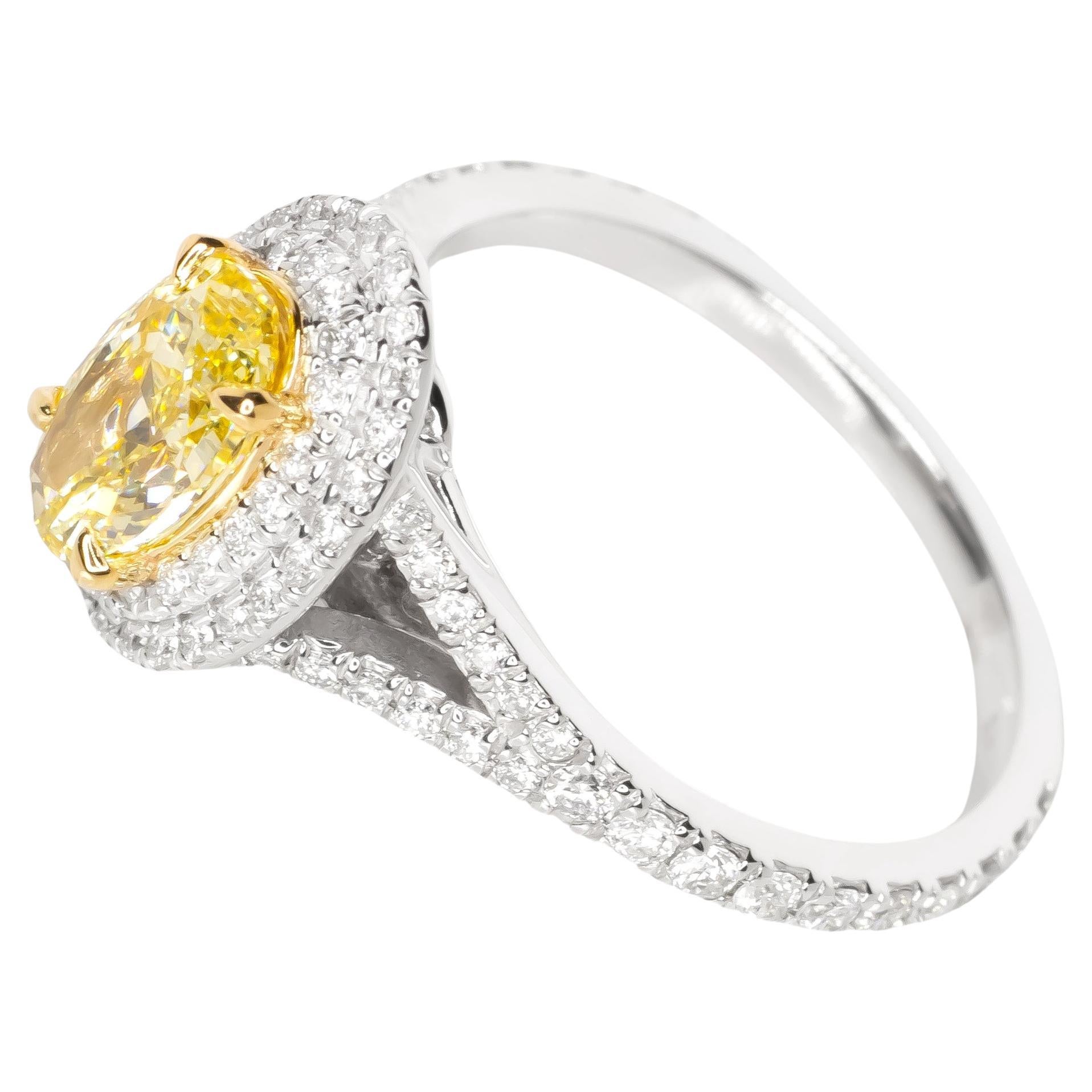1 carat fancy yellow oval diamond set with a white round diamonds double halo in yellow gold.

Designer: Antinori di Sanpietro
Material: 14k white and yellow gold
Diamond: 1 oval shape = 1.00ct
Colour: Fancy yellow
Clarity: VVS2
GIA: 2221085514
Ring