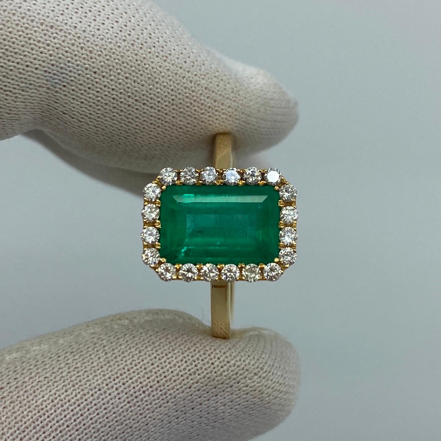 GIA Certified Vivid Green 3.06 Total Carat Colombian Emerald & Diamond 18k Yellow Gold Halo Ring.

Large 2.72 carat emerald with a stunning intense vivid green colour and very good clarity.
There are some natural inclusions, as to be expected with