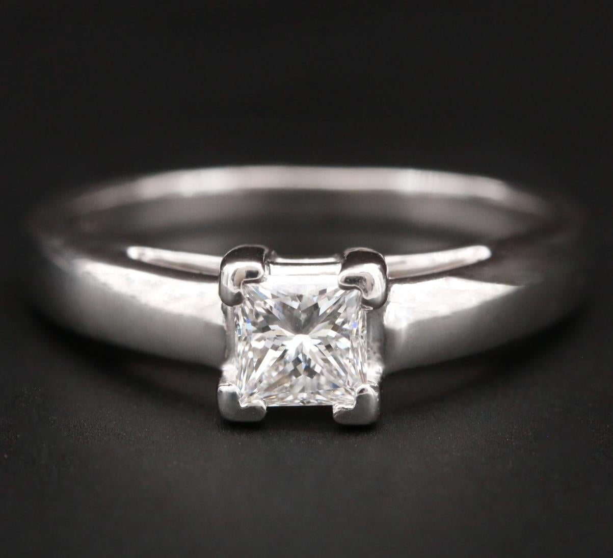 NEW with Tags, Tag price $5950

Bailey, Banks & Biddle high end NY jewelry brand, stamped BBB

GIA certified and laser inscribed 0.53 Natural Princess Cut diamonds, VS2 Clarity, G colorless grade (report is printable)

950 Sold Platinum, high