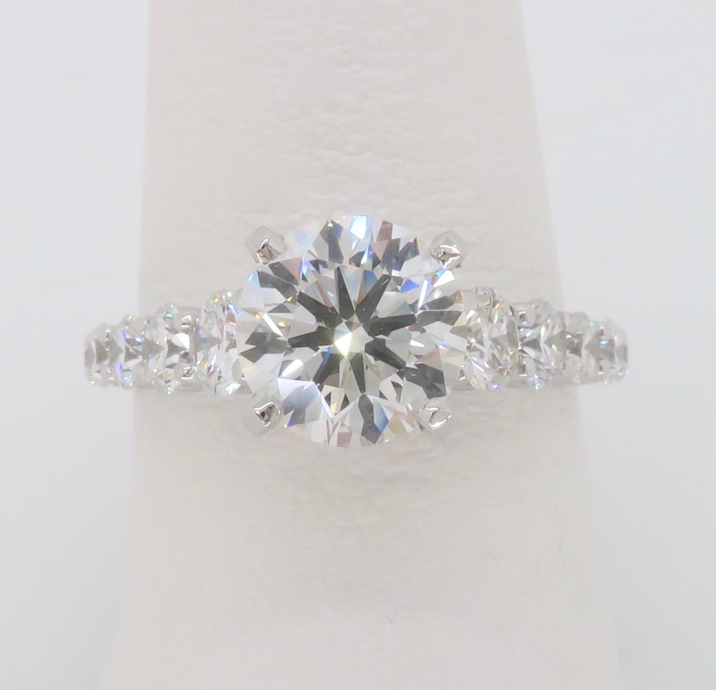 Stunning Platinum Gabriel & Co. 2.42ctw diamond ring set with a GIA certified 1.50ct Round Brilliant cut diamond in the center. 

Center Diamond Carat Weight: 1.50CT
Center Diamond Cut: Round Brilliant
Center Diamond Color: G
Center Diamond Clarity:
