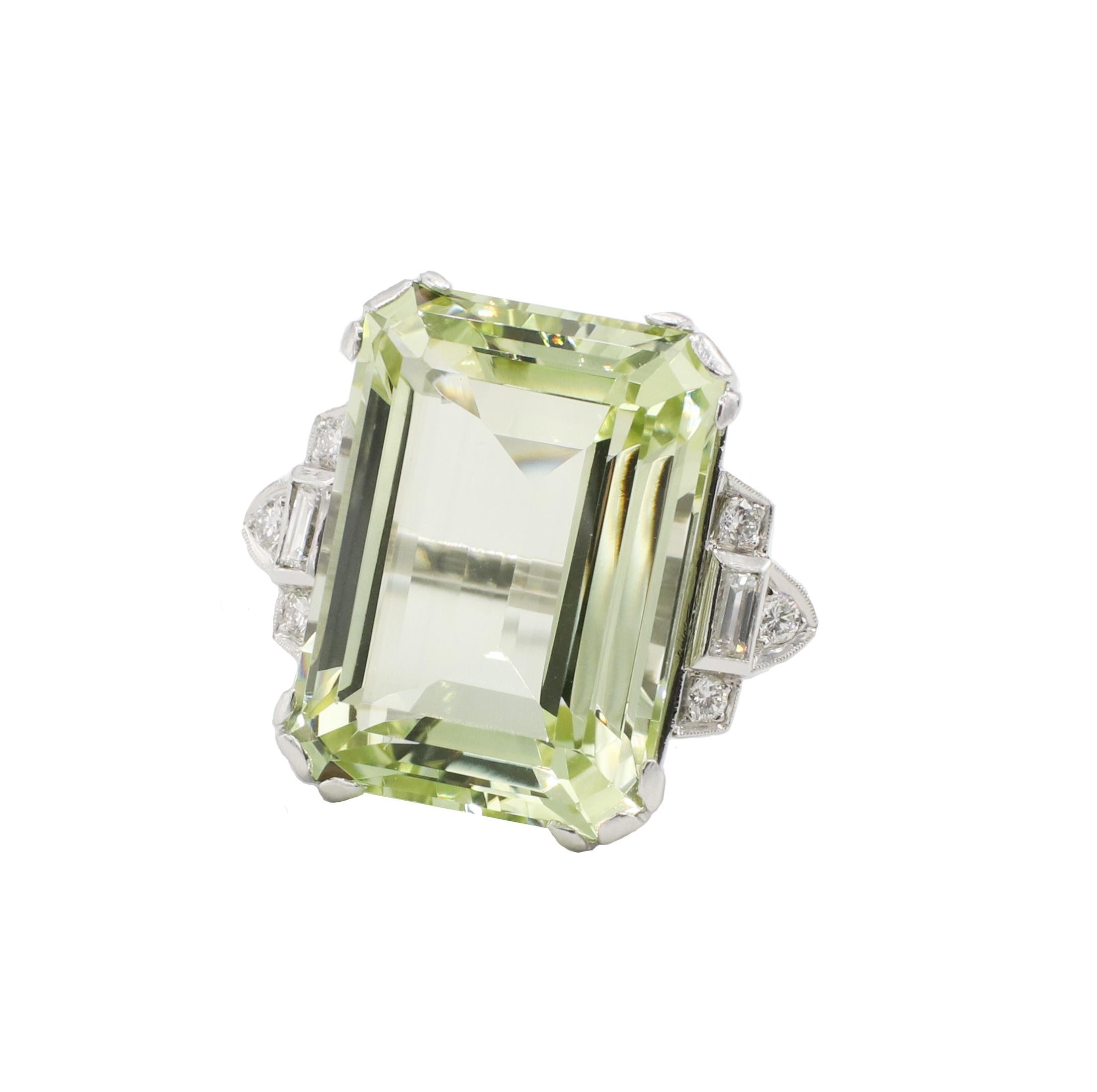 GIA Certified Green Beryl & Natural Diamond Art Deco Platinum Cocktail Ring Signed C.J. Auger
GIA report number: 5221856272
Metal: Platinum
Weight: 14.7 grams
Gemstone: Natural green beryl 20.1 x 14.6 x 9.45mm, approx. 19.60 carats
Diamonds: 6 round