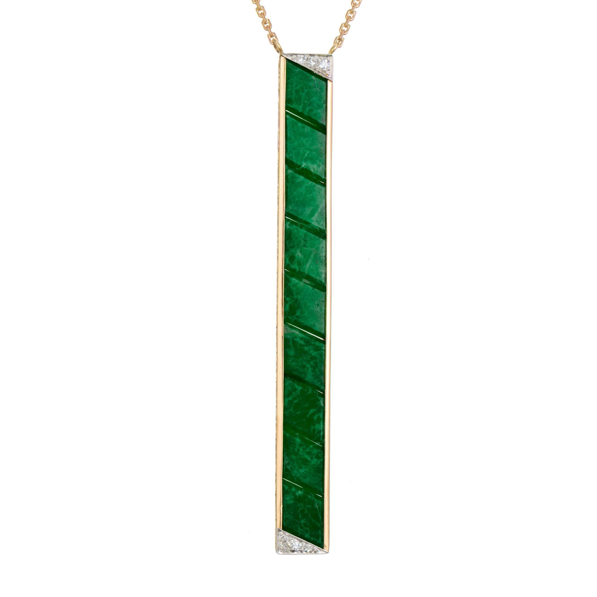 Art Deco Jadeite Jade pendant necklace. GIA certified green natural Lozenge tablet cut Jadeite Jade long bar pendant framed in 14k yellow gold and with platinum corners accented with 3 single cut diamonds in each corner. Certified by the GIA as