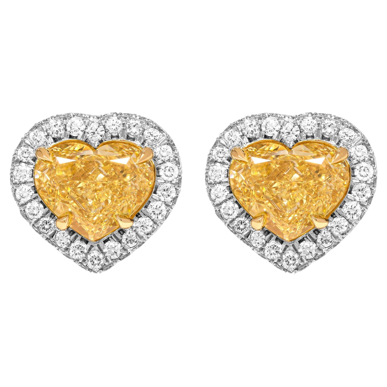 GIA Certified Halo Stud Earrings with Fancy Yellow Heart Shape Diamonds For Sale