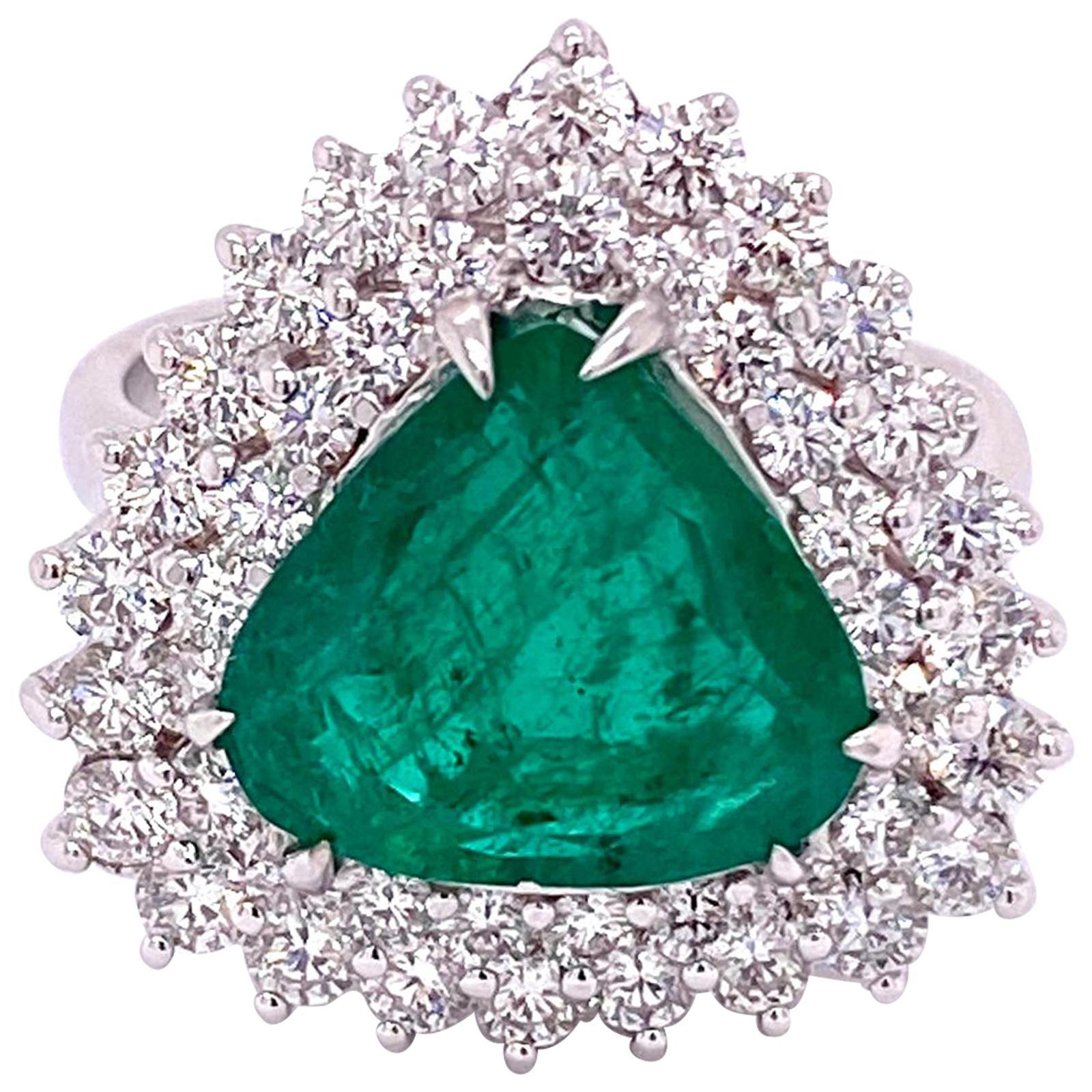 GIA Certified Handcrafted 5.30 Carat Natural Emerald 18 Karat White Gold Ring For Sale