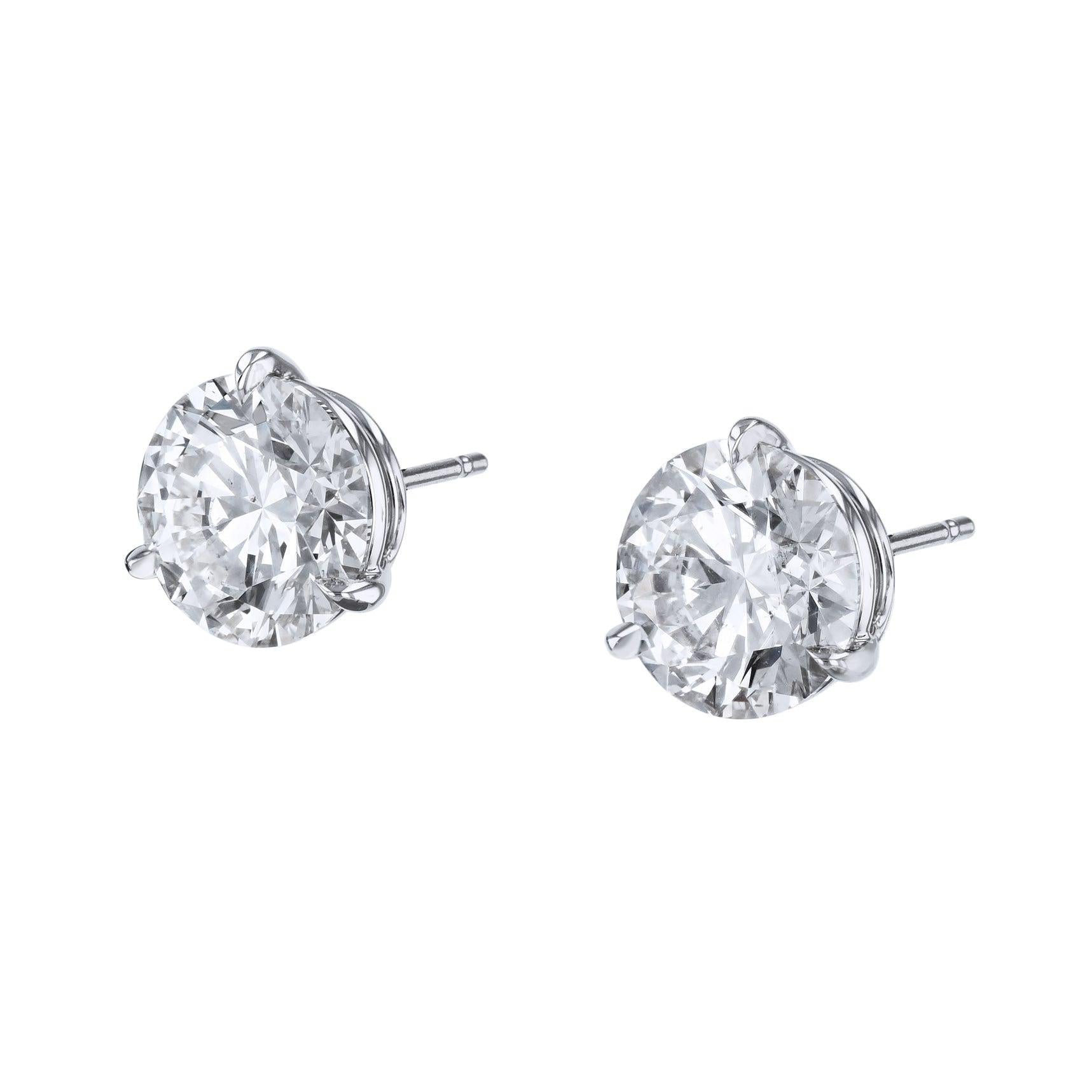 Adorn your ears with these amazing 10.08 carat Total Weight Diamond Stud Earrings.
The color is I & J with SI1 clarity ( EX,EX,EX).

10.08ct Total Weight    I & J SI2 ( EX,EX,EX)  Diamonds.

Earring one is 5.06ct I-SI2 (EX,EX,EX).
G.I.A.