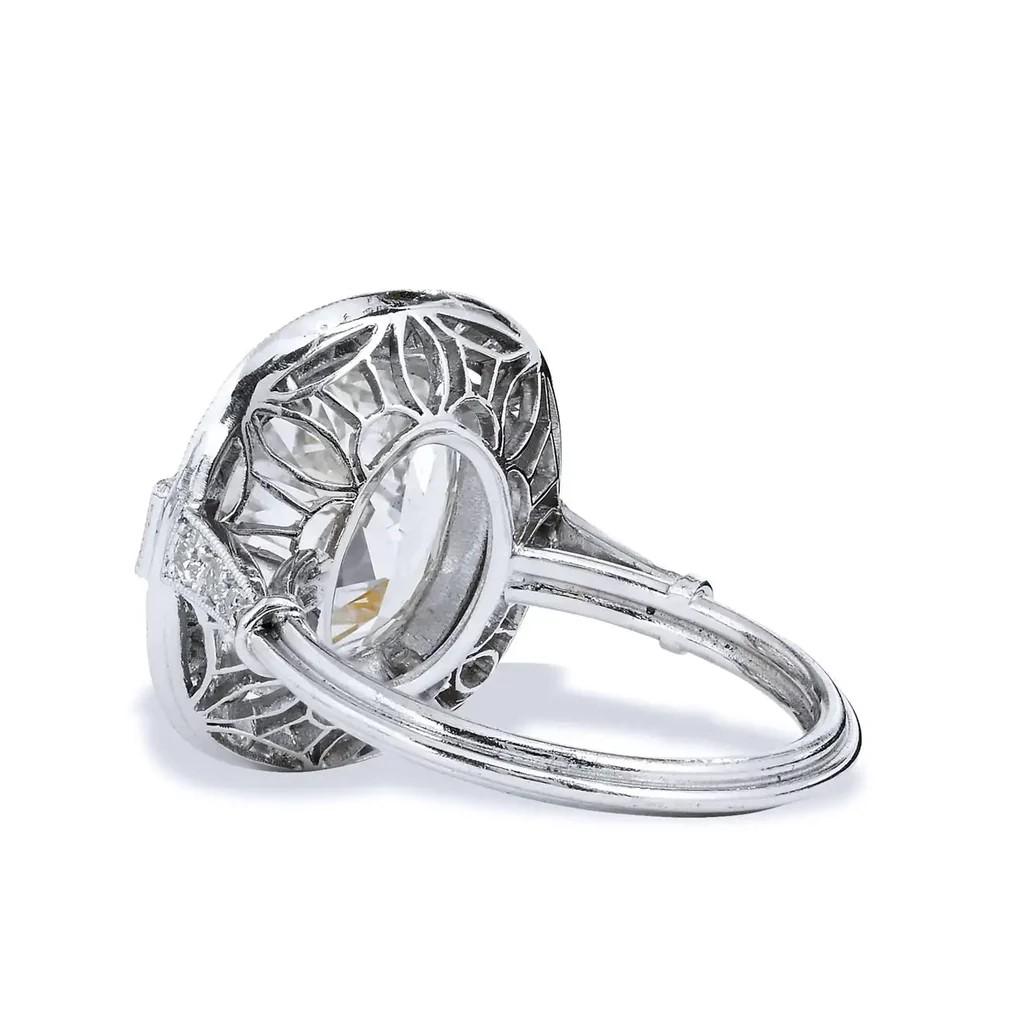 Art Deco GIA Certified Handmade 6.53 Carat Cushion Cut Brilliant Diamond Engagement Ring For Sale