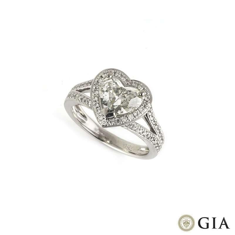 A beautiful heart cut diamond set in 18k white gold. The diamond weighs 1.29ct, the colour is I and the clarity is VS2 and is surrounded by a pave set heart shaped diamond halo. This is accentuated by a diamond pave set split shank. The ring is