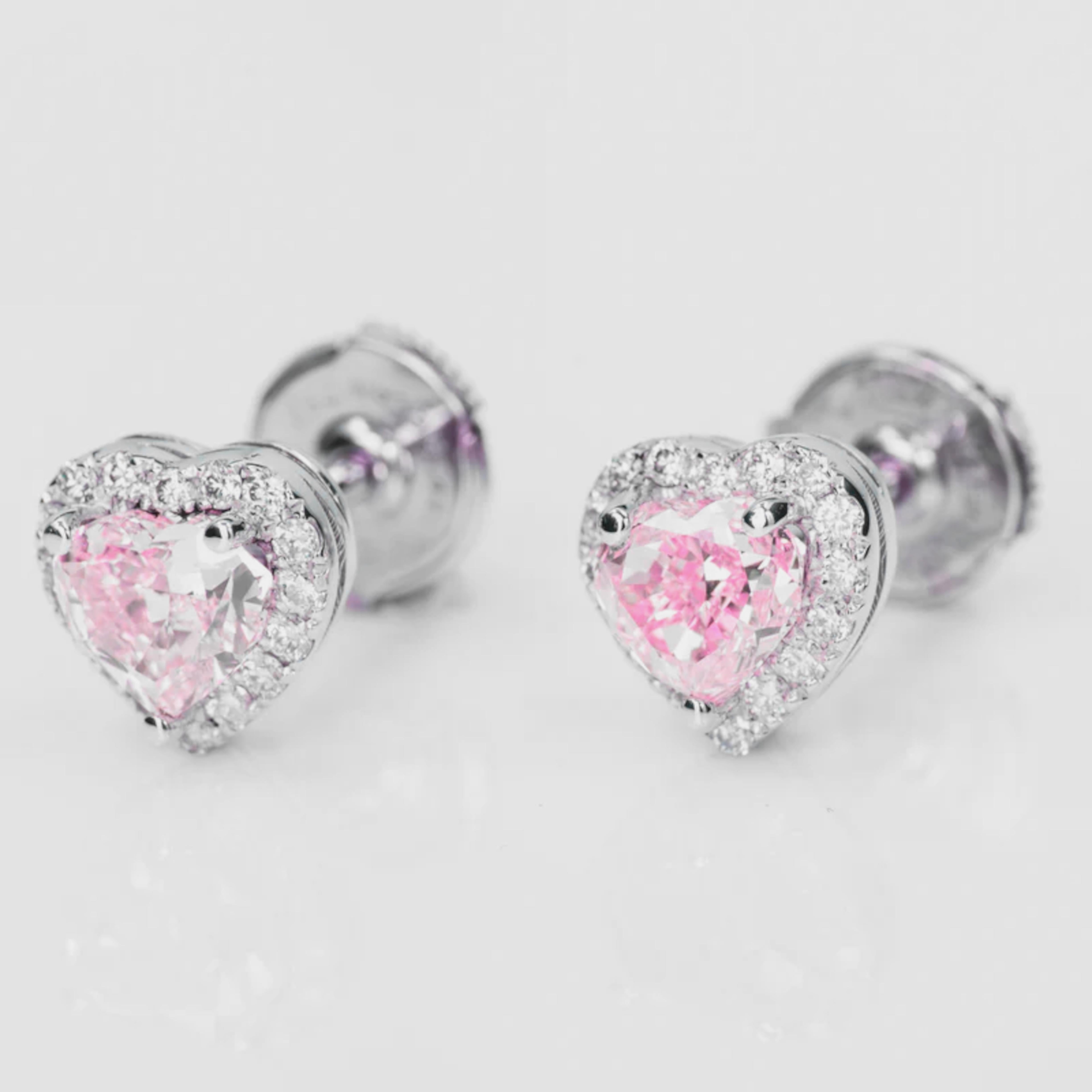 Contemporary GIA Certified Heart Cut Fancy Light Pink Diamond Studs For Sale