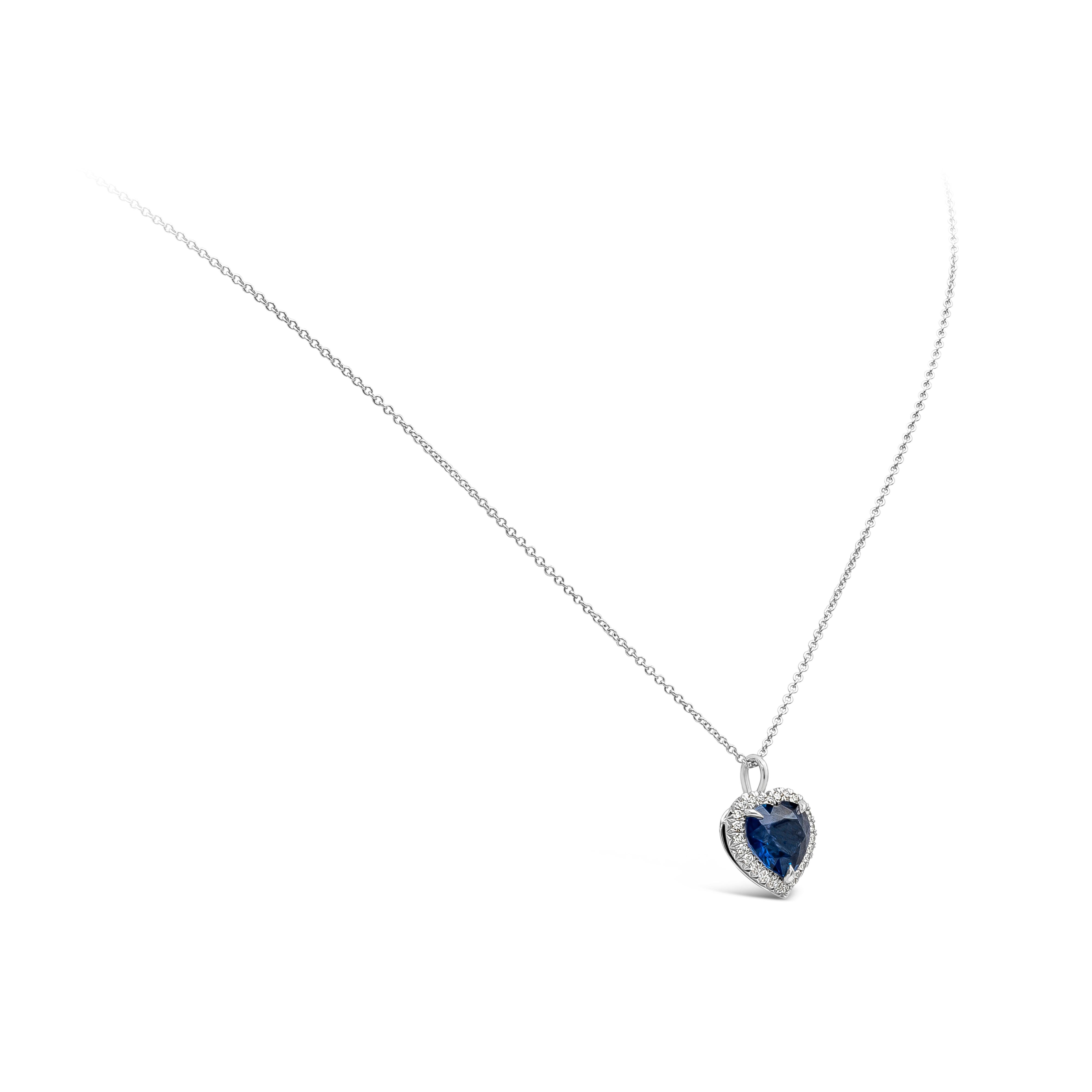 A versatile and unique pendant necklace showcasing a 2.58 carats heart shape blue sapphire certified by GIA as Sri Lanka origin. Surrounded by a row of round brilliant diamonds weighing 0.20 carats total, F color and VS in clarity. Finely made in