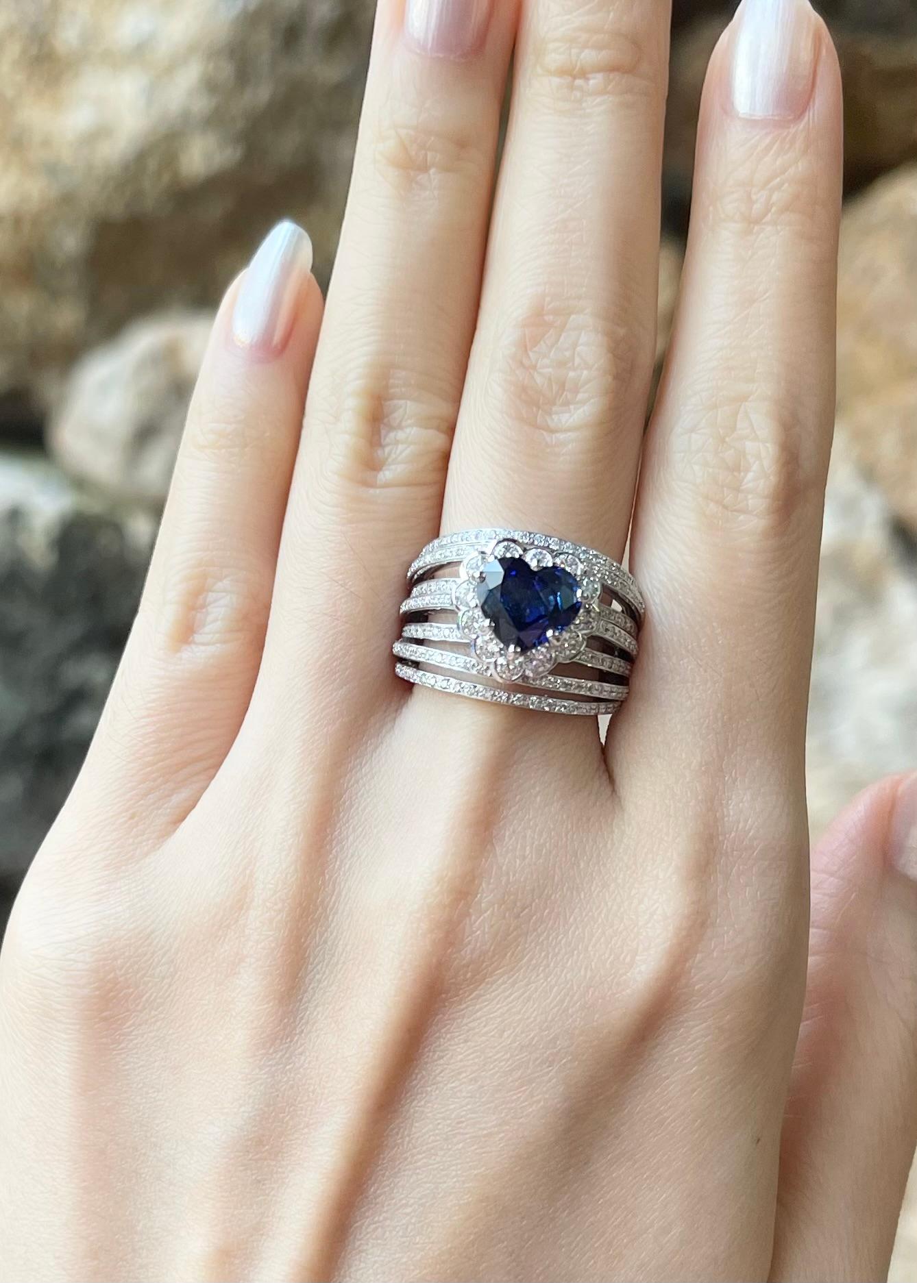 Blue Sapphire 2.88 carats with Diamond 1.18 carats Ring set in 18K White Gold Settings

Width:  2.2 cm 
Length: 1.6 cm
Ring Size: 55
Total Weight: 13.65 grams

