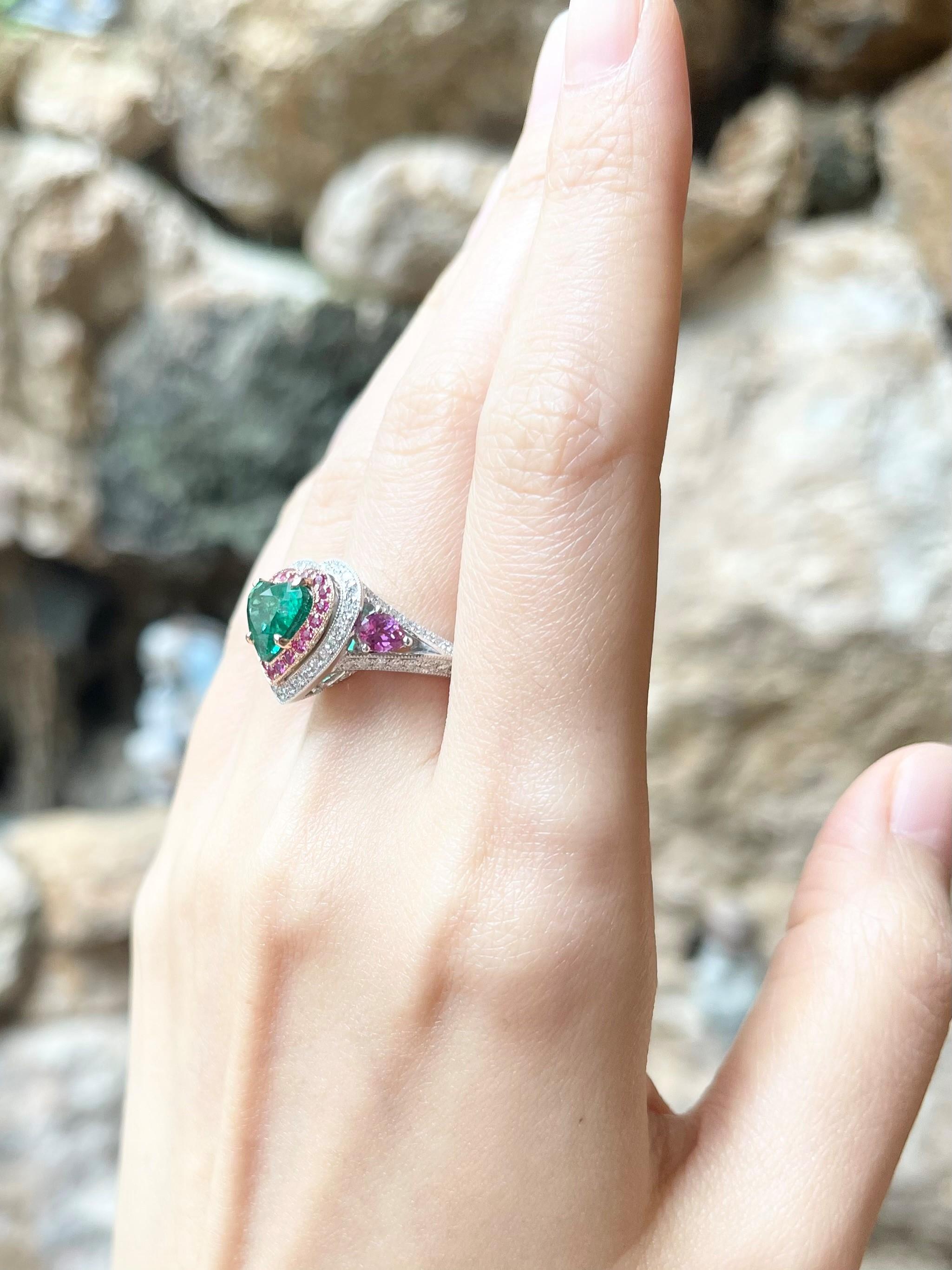 GIA Certified Zambian Emerald 2.44 carats, Pink Sapphire 1.0 carat and Diamond 0.70 carat Ring set in 18K White Gold Settings

Width:  1.6 cm 
Length: 1.5 cm
Ring Size: 51
Total Weight: 9.87 grams

