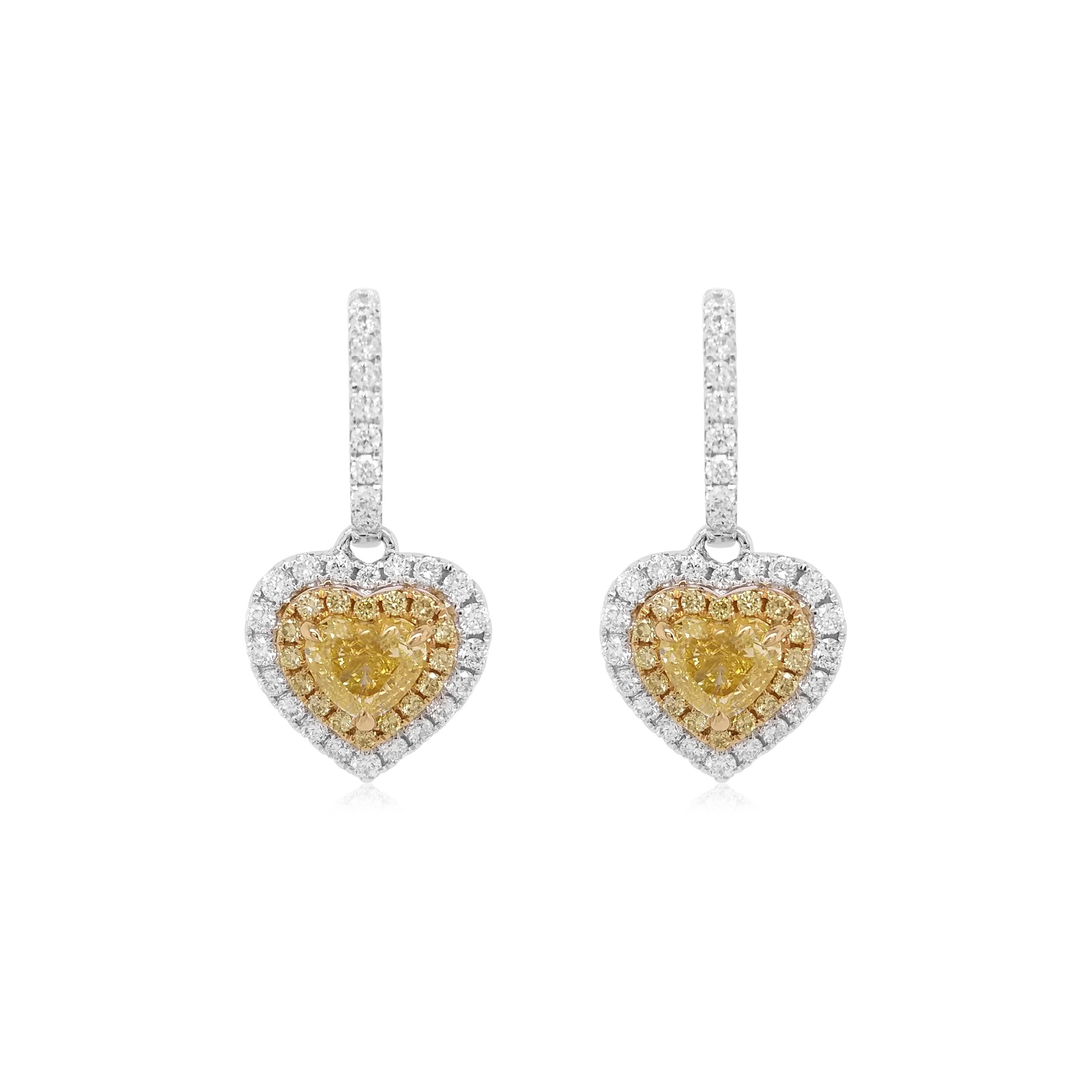 Embrace the Festive Spirit with Timeless Luxury! Beautiful dangling Yellow diamond earrings, in a sweet heart shape, set in 18K gold.

NATURAL FANCY YELLOW DIAMOND- 1.02 CT, GIA CERTIFIED
YELLOW DIAMOND-0.14CT
WHITE DIAMOND-0.56 CT
MADE IN 18K