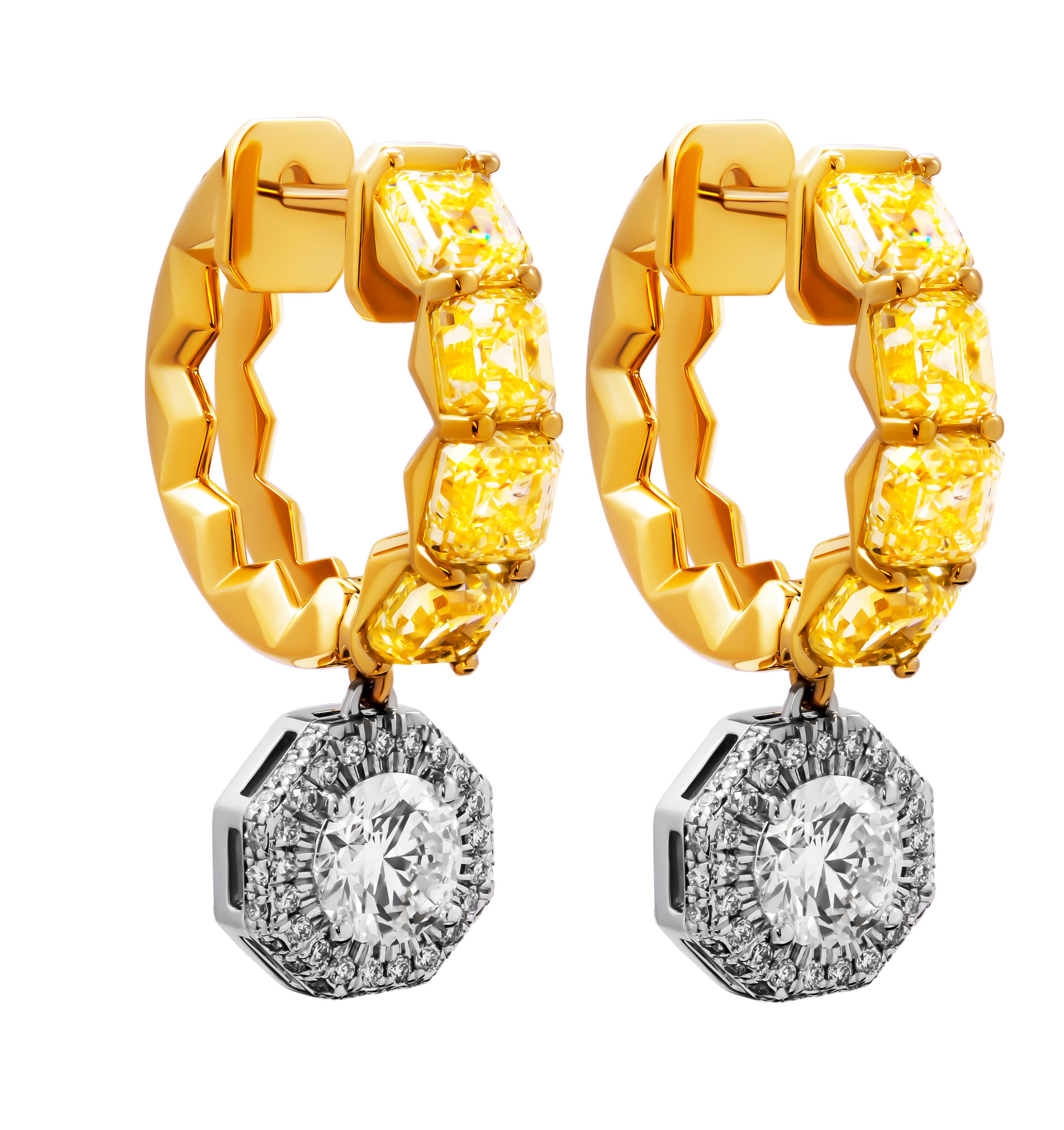 ndulge in the luxurious allure of these exquisite Fancy Yellow Hoop Earrings, featuring intricate white diamond details. Expertly crafted in a blend of 18k yellow gold and 18k white gold, these drop earrings exude sophistication and elegance.

Each