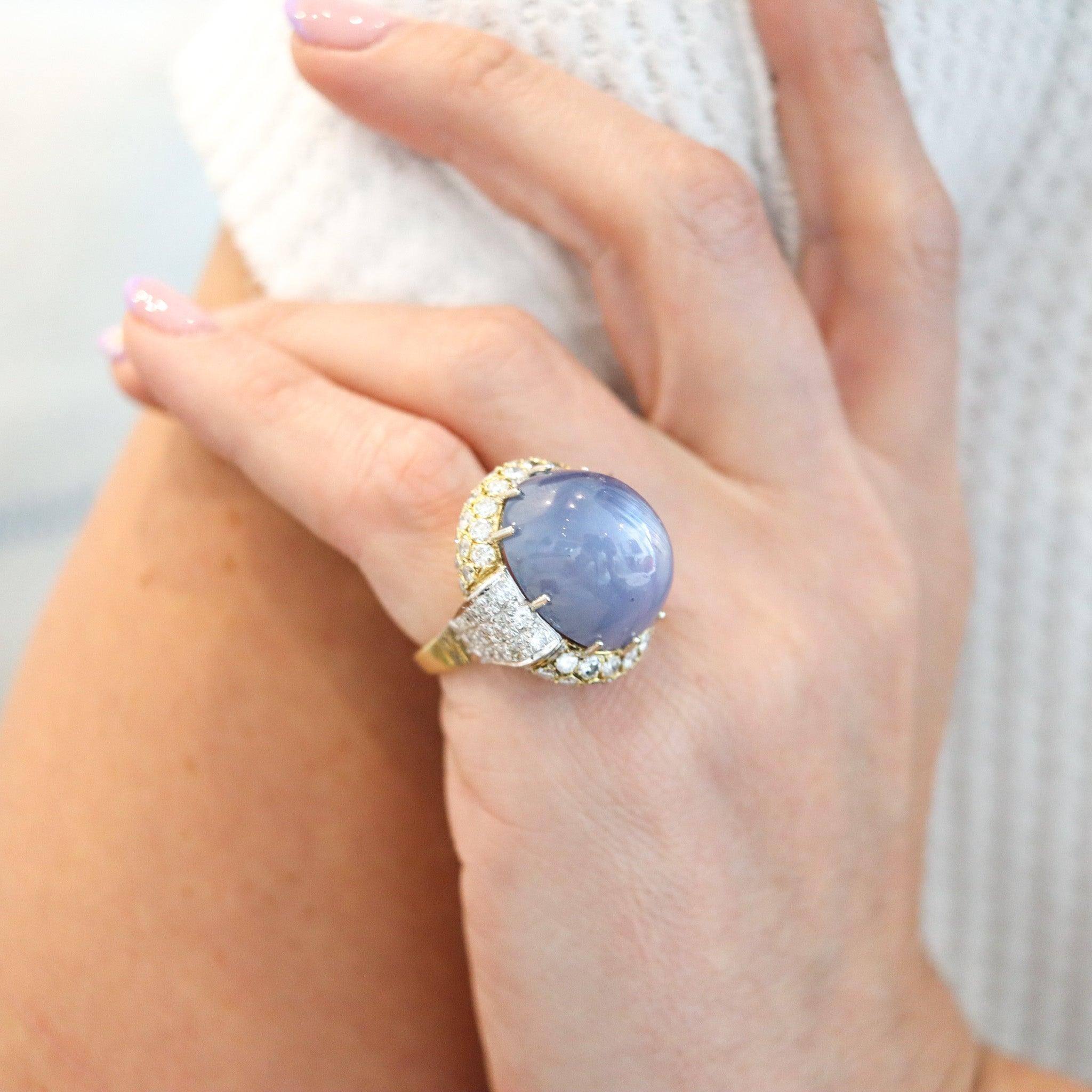 Cocktail ring with a huge star sapphire certified by the GIA.

This is a gorgeous oversized cocktail ring, created with a huge and bold look and great eye appeal. The ring mounting have been crafted with outstanding details in solid yellow and white