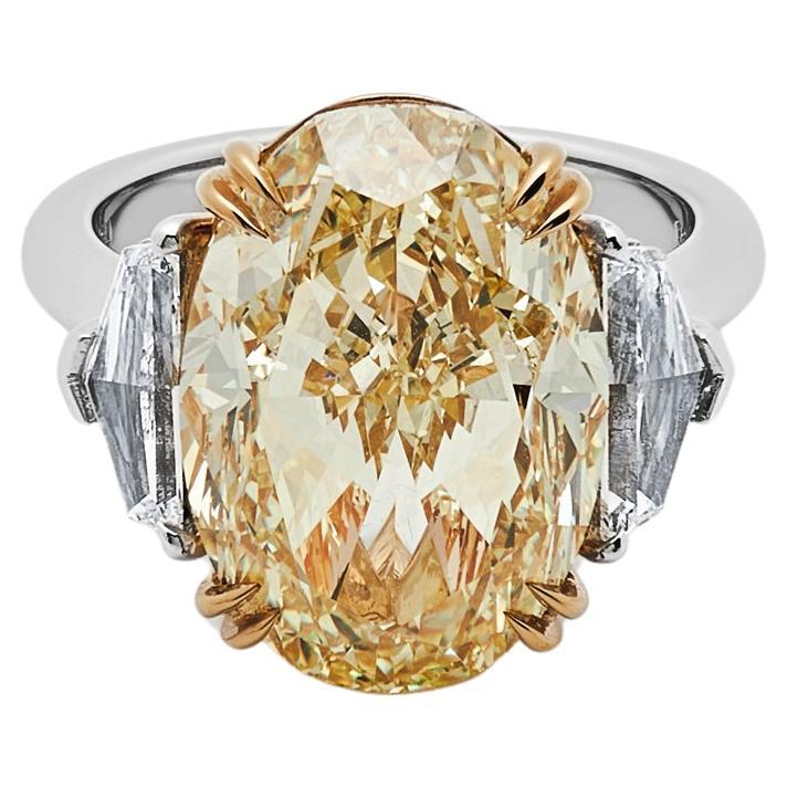 GIA Certified Intense Yellow Oval Diamond Ring II For Sale