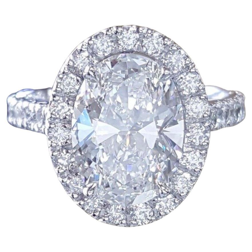 Bague en platine avec diamant ovale de 2 carats, certifié par le GIA et sans défaut interne en vente