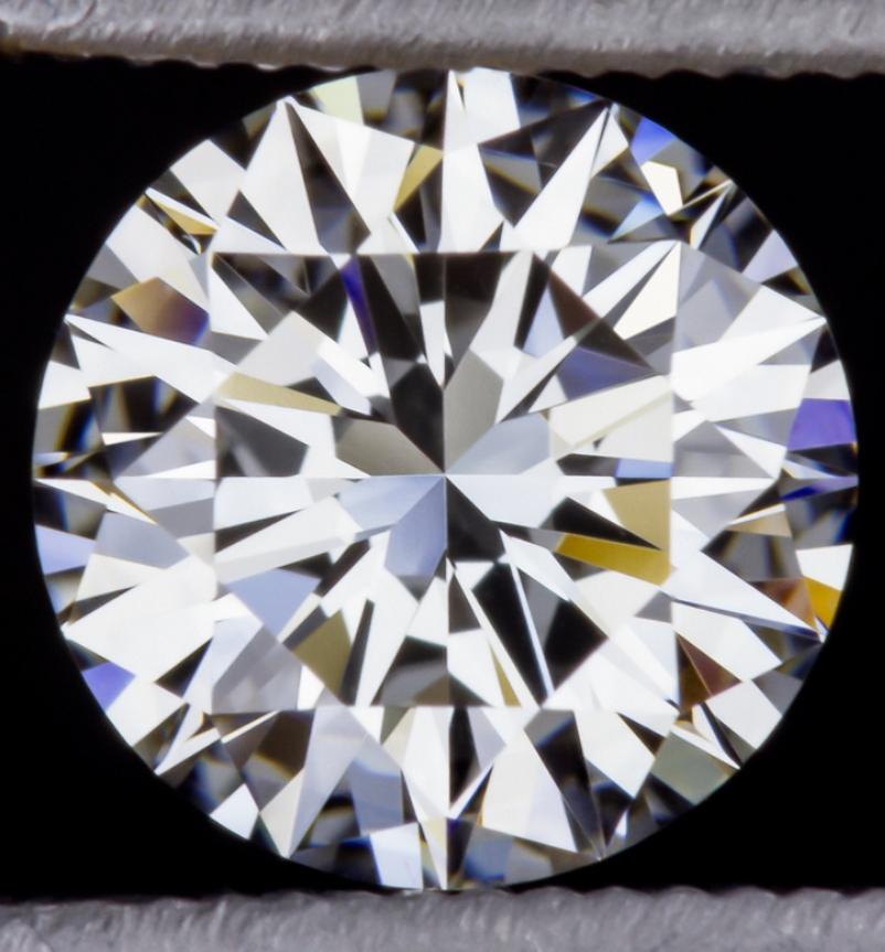 Dazzling and substantial 1.50ct round brilliant cut diamond is bright white, completely eye clean, and impeccably finished! Cut with absolutely ideal proportions, it displays truly phenomenal sparkle! 

The diamond is certified by GIA, the world’s