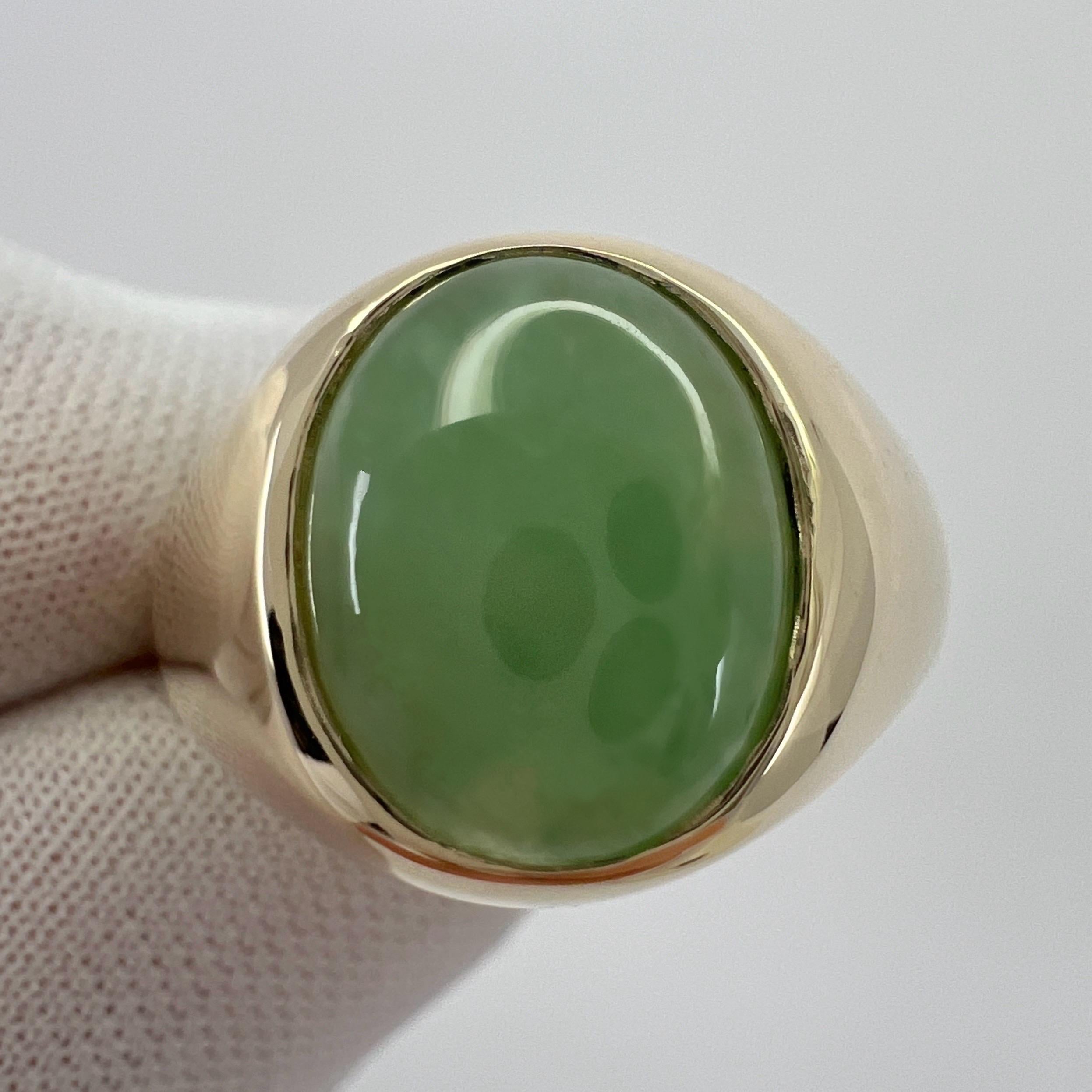 GIA Certified A-Grade Jadeite 9k Yellow Gold Oval Signet Ring.

A stunning 4.06 carat untreated green jadeite jade set in a fine 9k yellow gold rubover bezel signet ring.

This jade has an excellent oval cabochon cut showing the colour beautifully.