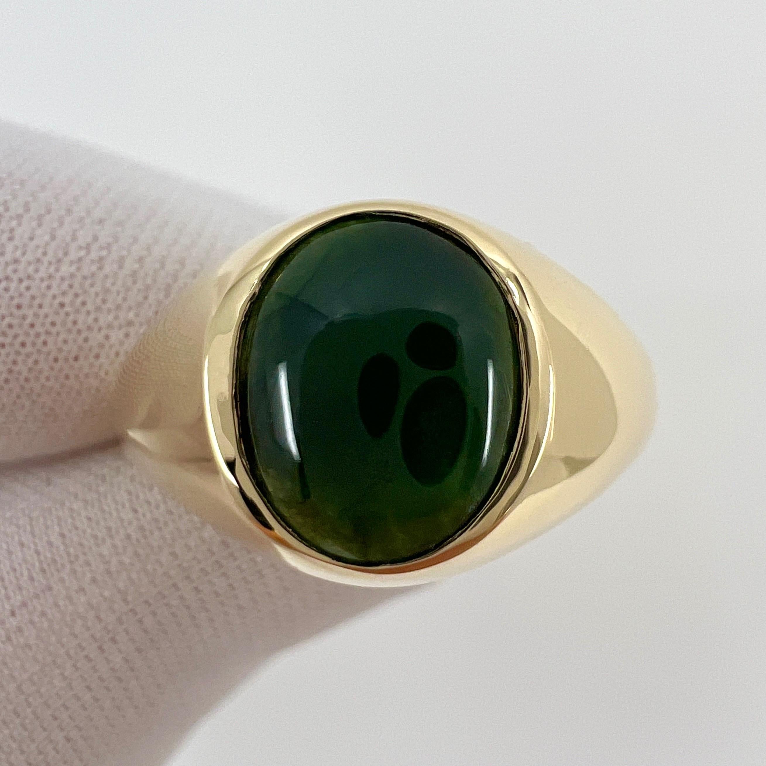 GIA Certified A-Grade Deep Green Jadeite 9k Yellow Gold Signet Ring.

A stunning 2.67 carat untreated green jadeite jade set in a fine 9k yellow gold rubover bezel signet ring.

This jade has an excellent oval cabochon cut showing the colour