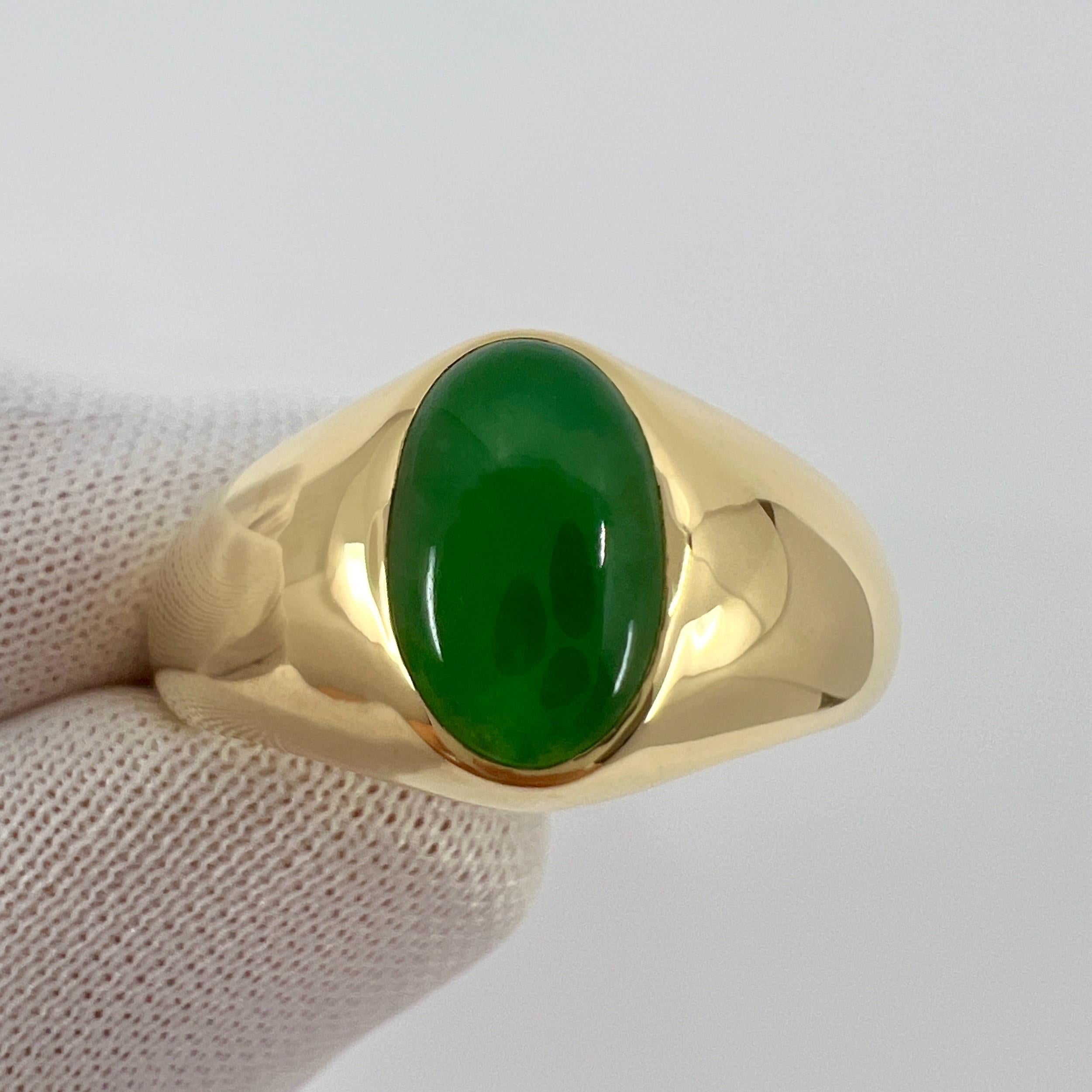 GIA Certified A-Grade Vivid Green Jadeite 18k Yellow Gold Signet Ring.

A stunning 1.43 carat untreated vivid green jadeite jade set in a fine 18k yellow gold rubover bezel signet ring.

This jade has an excellent oval cabochon cut showing the