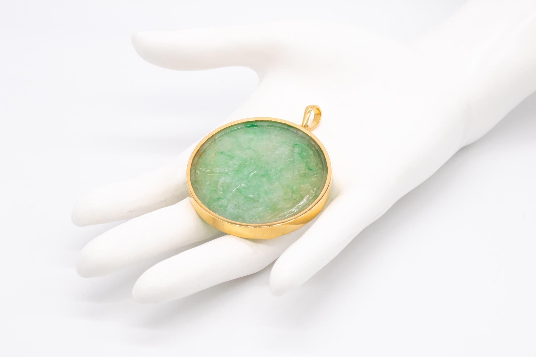Magnificent Chinese pendant with carving of Jadeite Green Jade.

A beautiful piece of carved jade mounted in jewelry. The jade is carved from a single piece and set in a custom made frame mounting, crafted in solid yellow gold of 18 karats, with