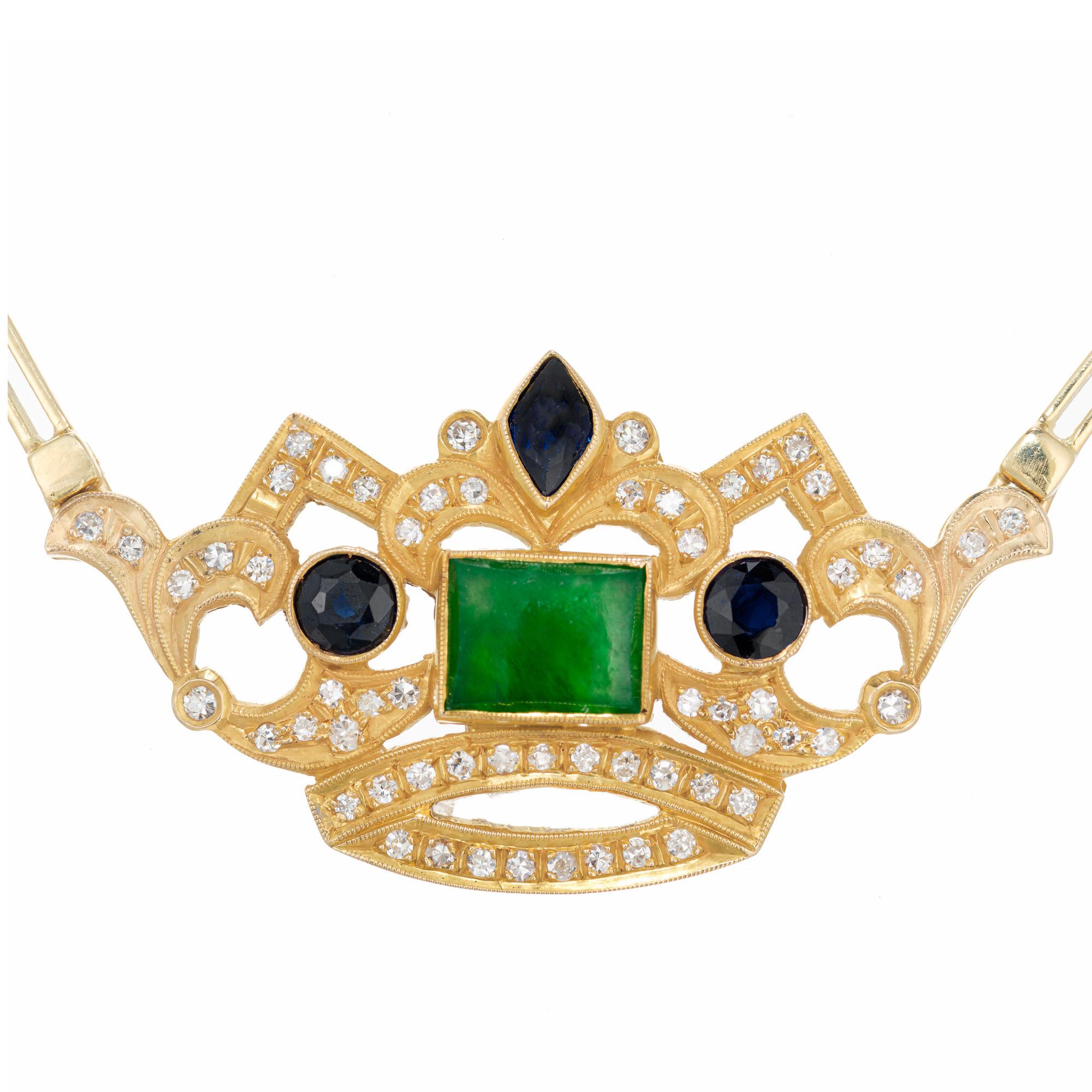 Vintage 1960's Jade, sapphire and diamond crown pendant necklace. The 18k yellow gold Crown has a GIA certified natural Jadeite Jade rectangular center stone which is certified as untreated. One GIA certified Marquise cut sapphire also certified as