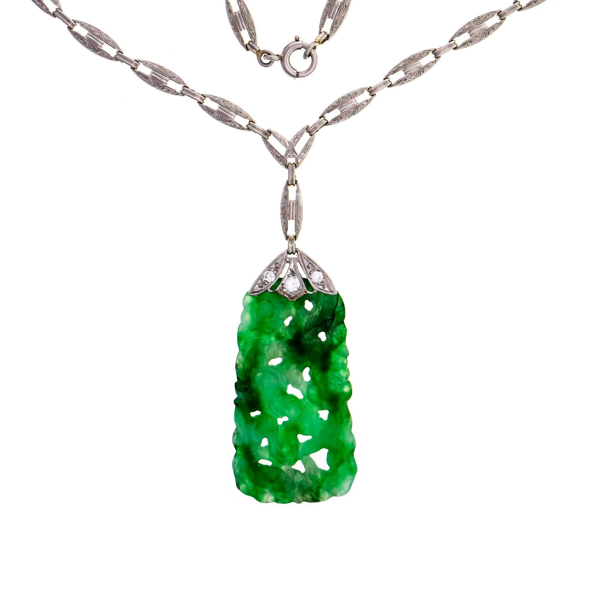 Handmade jadeite jade diamond pendant necklace.  vintage 1930 necklace with Platinum top over 14k yellow gold with handmade Platinum top link chain and Platinum link separators and spring ring. The center is a highly translucent natural Jadeite Jade