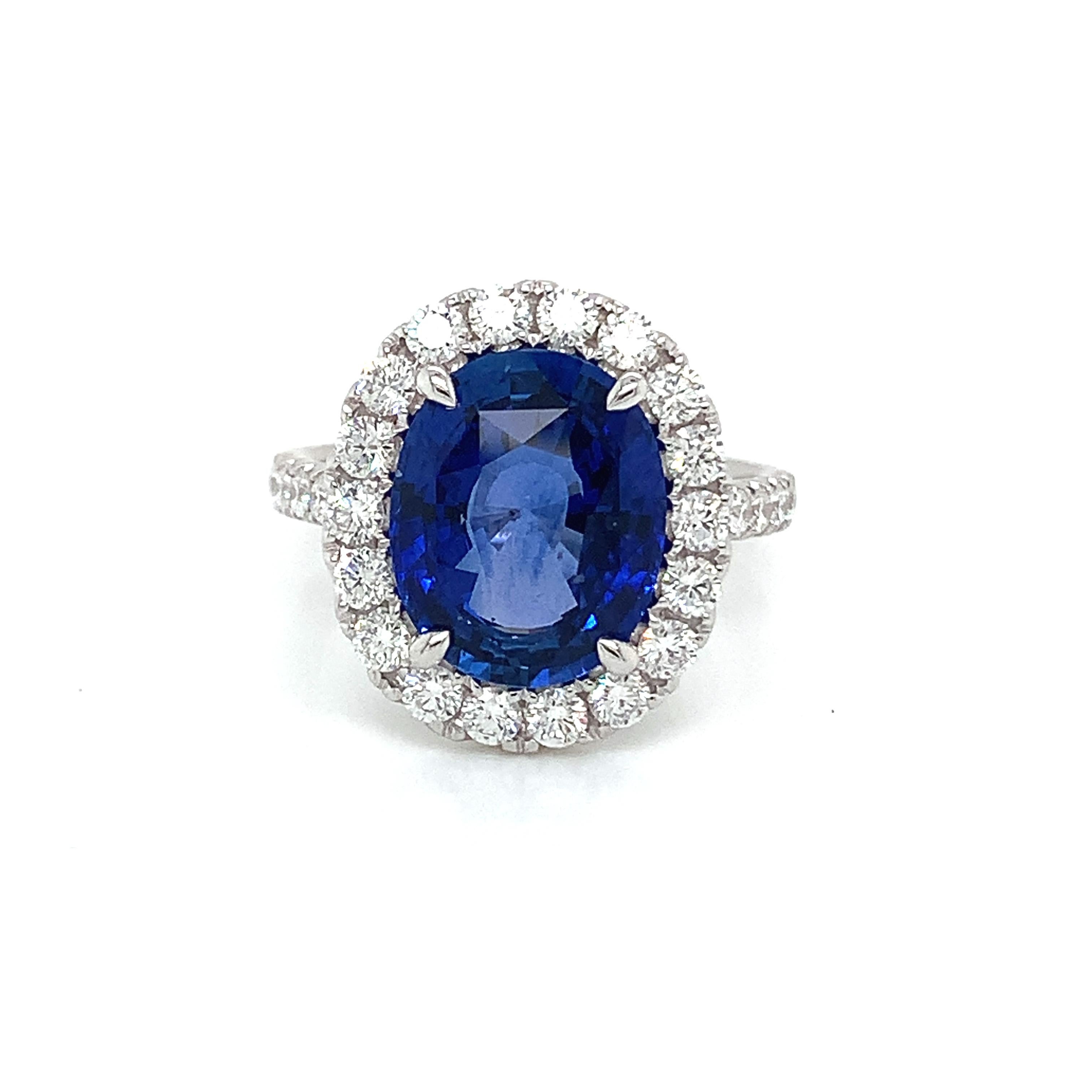 GIA oval Ceylon sapphire weighing 5.47 cts
Measuring (12.02x9.77x5.54) mm
Round diamonds weighing .93 cts
Set in 18k white gold ring
5.41 grams