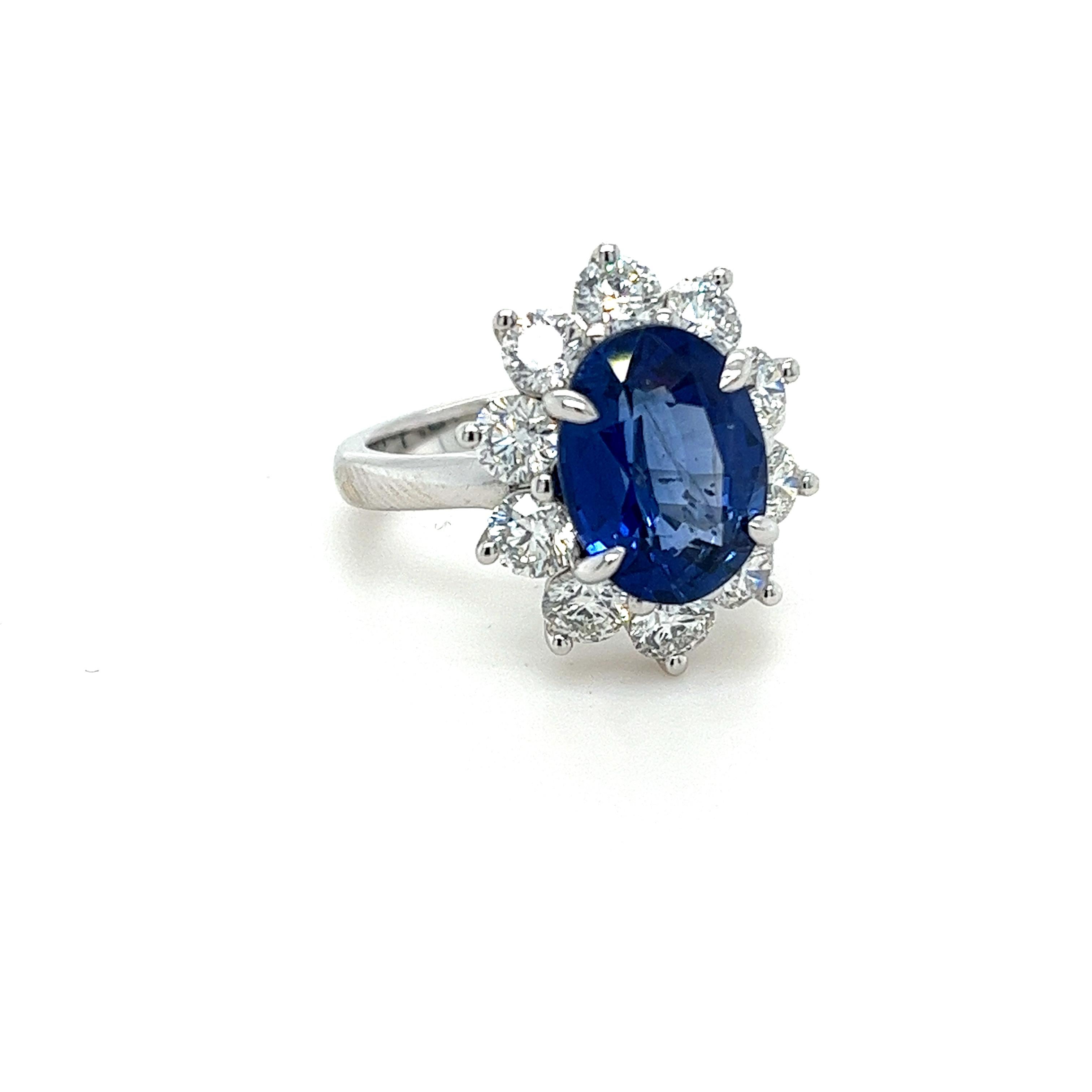GIA Certified oval Ceylon Sapphire weighing 4.98 carats
Measuring (11.89x8.98x5.53) mm
Diamonds weighing 2.02 carats
Set in 18 karat white gold ring

