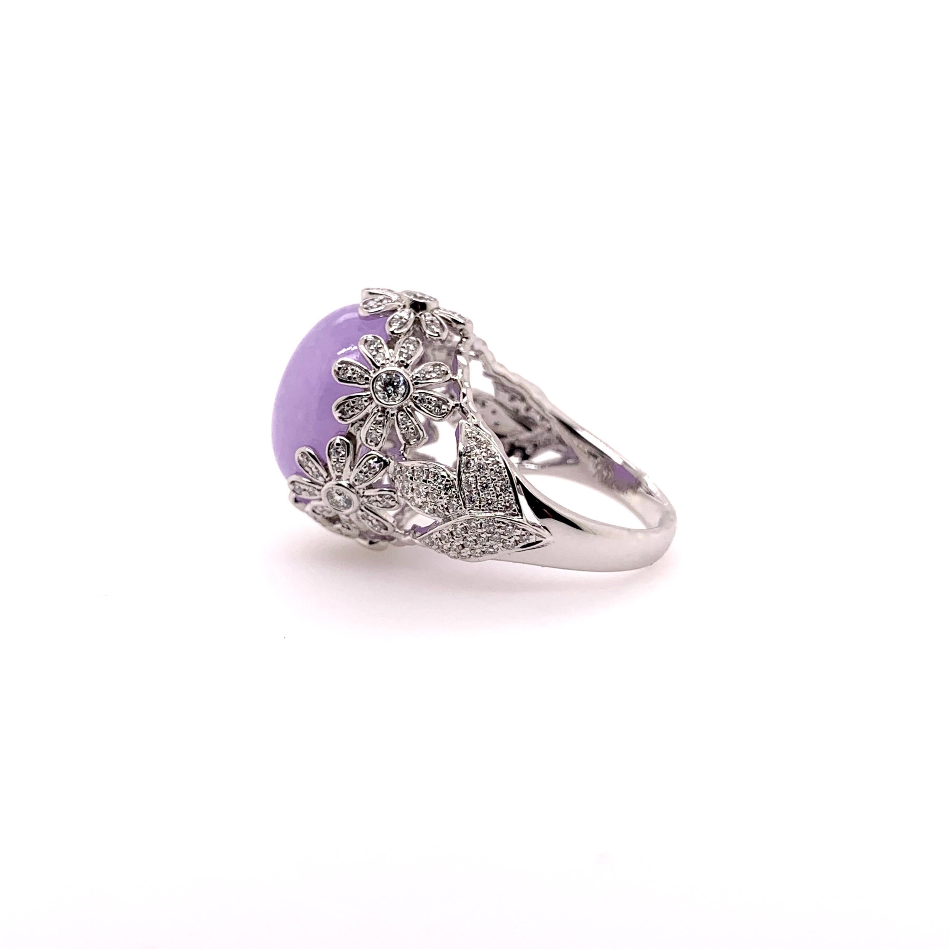 Handmade floral setting for this gorgeous GIA certified lavender cabachon jadeite ring!   The meticulous details in the flower-style setting accentuates the soothing color of the jadeite.  The round brilliant diamonds come to 0.76 cts. total weight