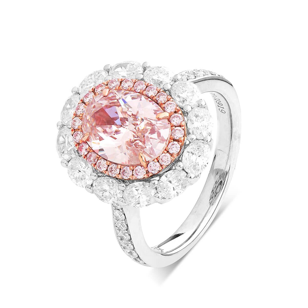 Natural Light Pink Diamond 2.01 Carat, surrounded by White Diamonds, all untreated. Making up a total of 3.50 Carats. Expertly crafted with 18 Karat White Gold. Oval shape. 
GIA certified. 
This Item can be adjusted, resized and customized.