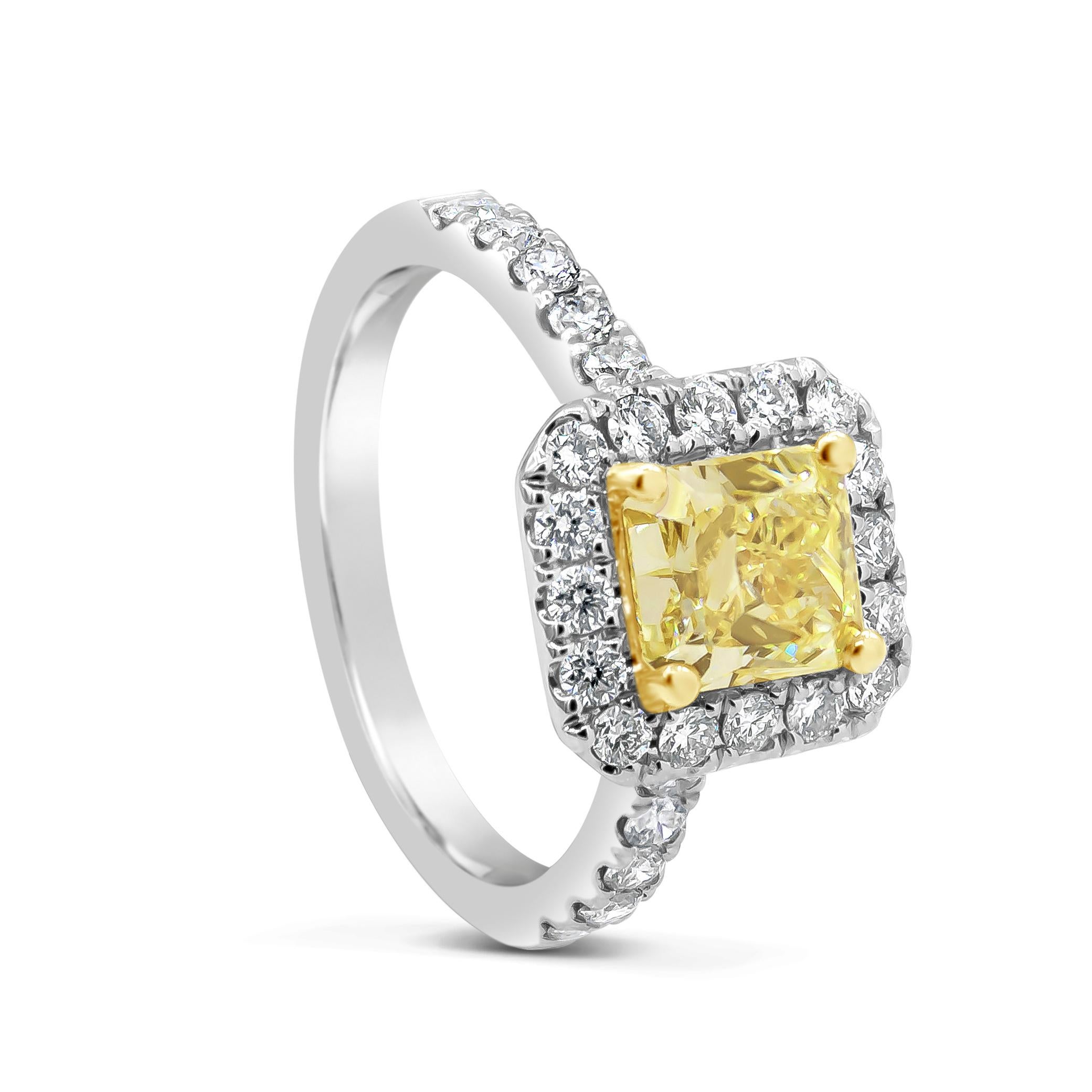 A stylish engagement ring showcasing a natural light yellow radiant cut diamond weighing 1.24 carats. GIA certified the diamond as natural light yellow (U-V) color. Surrounding the center stone is a single row of round brilliant diamonds on a