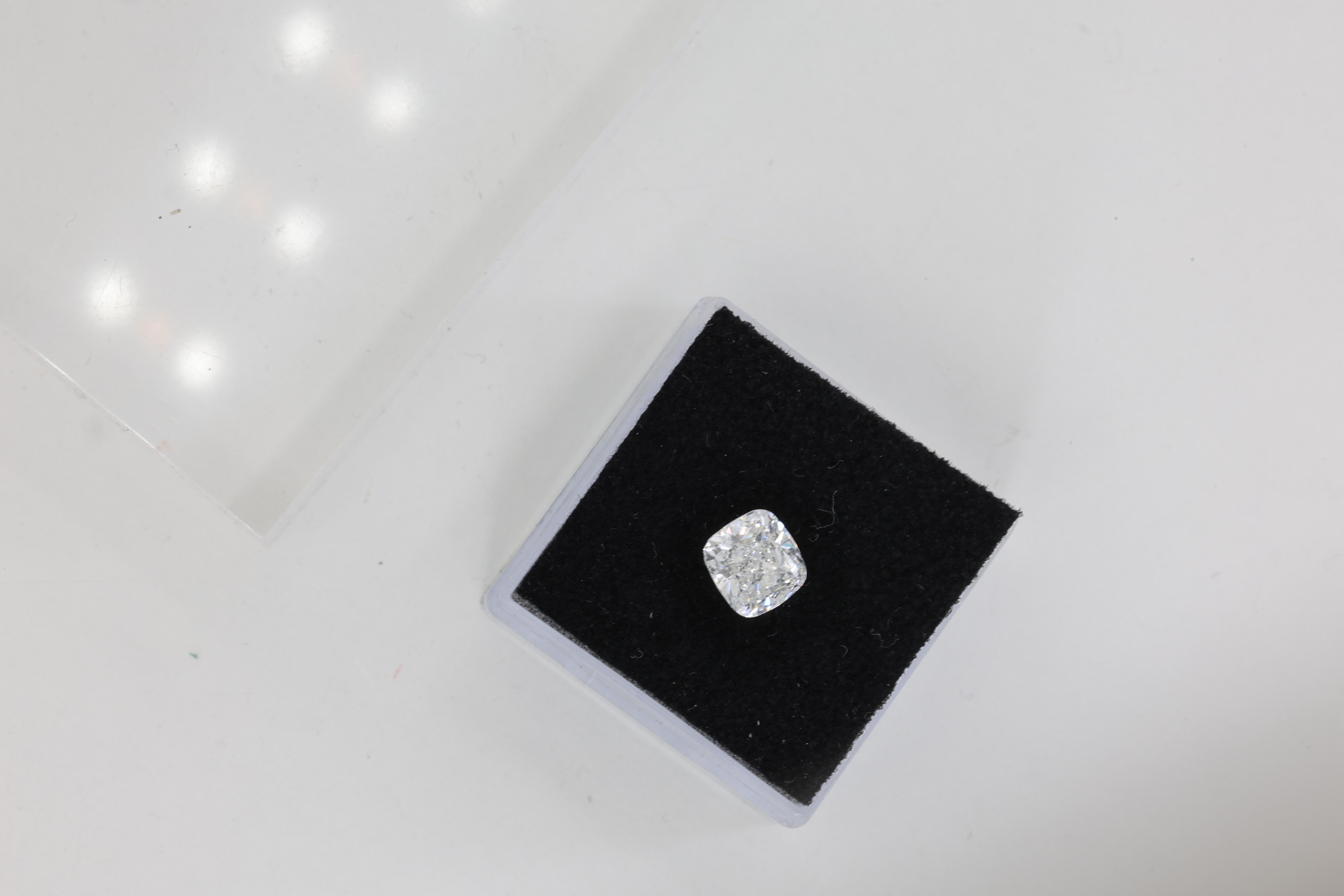 A Loose Stone- A beautiful Cushion Cut Modified Brilliant Diamond 1.51 Carats available to purchase loose or set in a custom designed ring (as pictured)

Color F 
Clarity VS2
Polish Excellent
Symmetry Very Good
Fluorescence Faint
GIA certificate