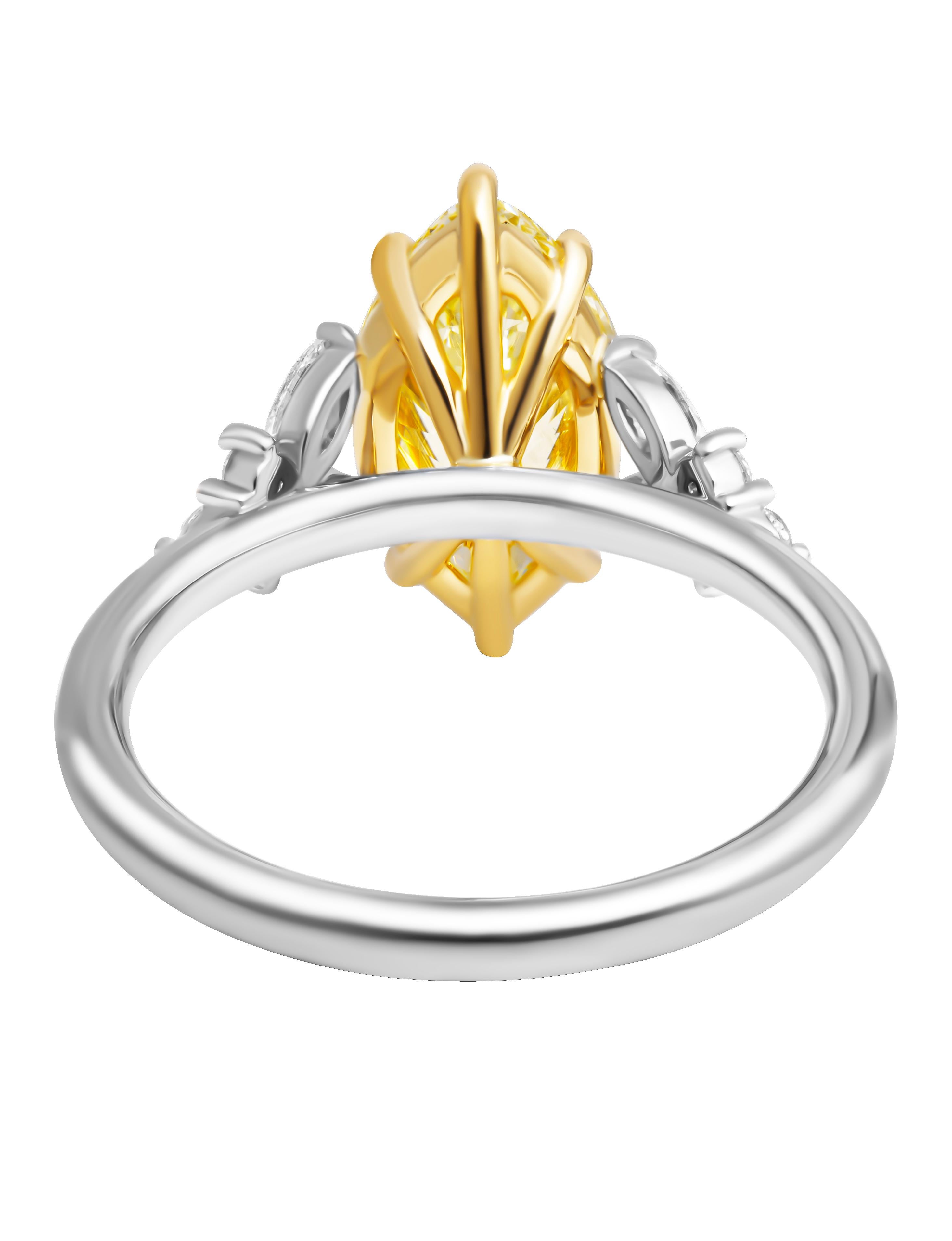 GIA Certified Marquee Multi Side Stone Ring with 2.01ct Marquee
In 18k Yellow Gold & Platinum
Center stone: 2.01ct Marquise U to V Range VS2
GIA:7235358666
Marquee & Rounds Side stones F/G color & VS clarity 
Marquee totaling 0.23CT
Rounds totaling